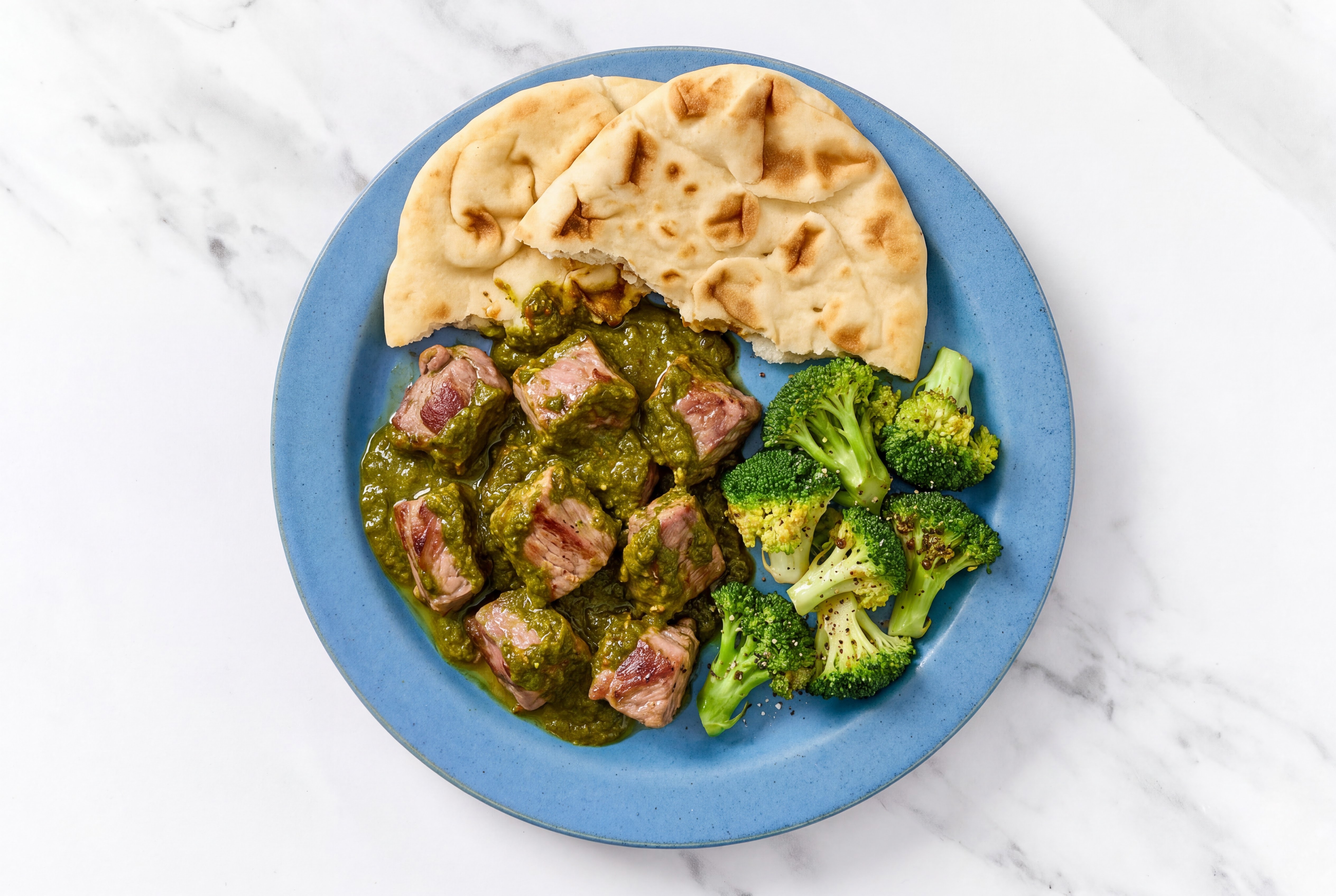 Herby Lamb Saag + Naan with Broccoli Florets
