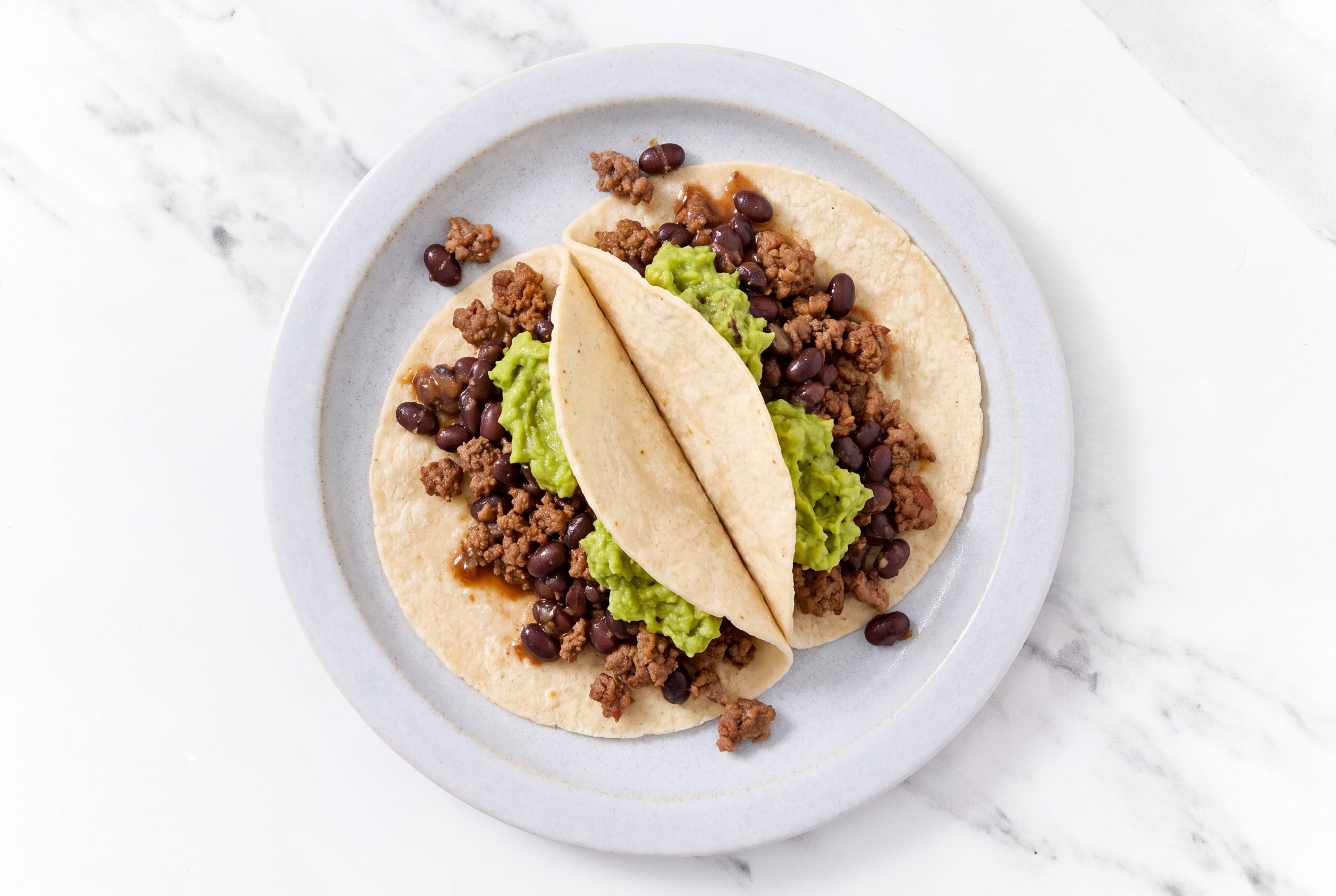 Ground 93/7 Lean Beef Tacos with Guacamole & Spiced Beans