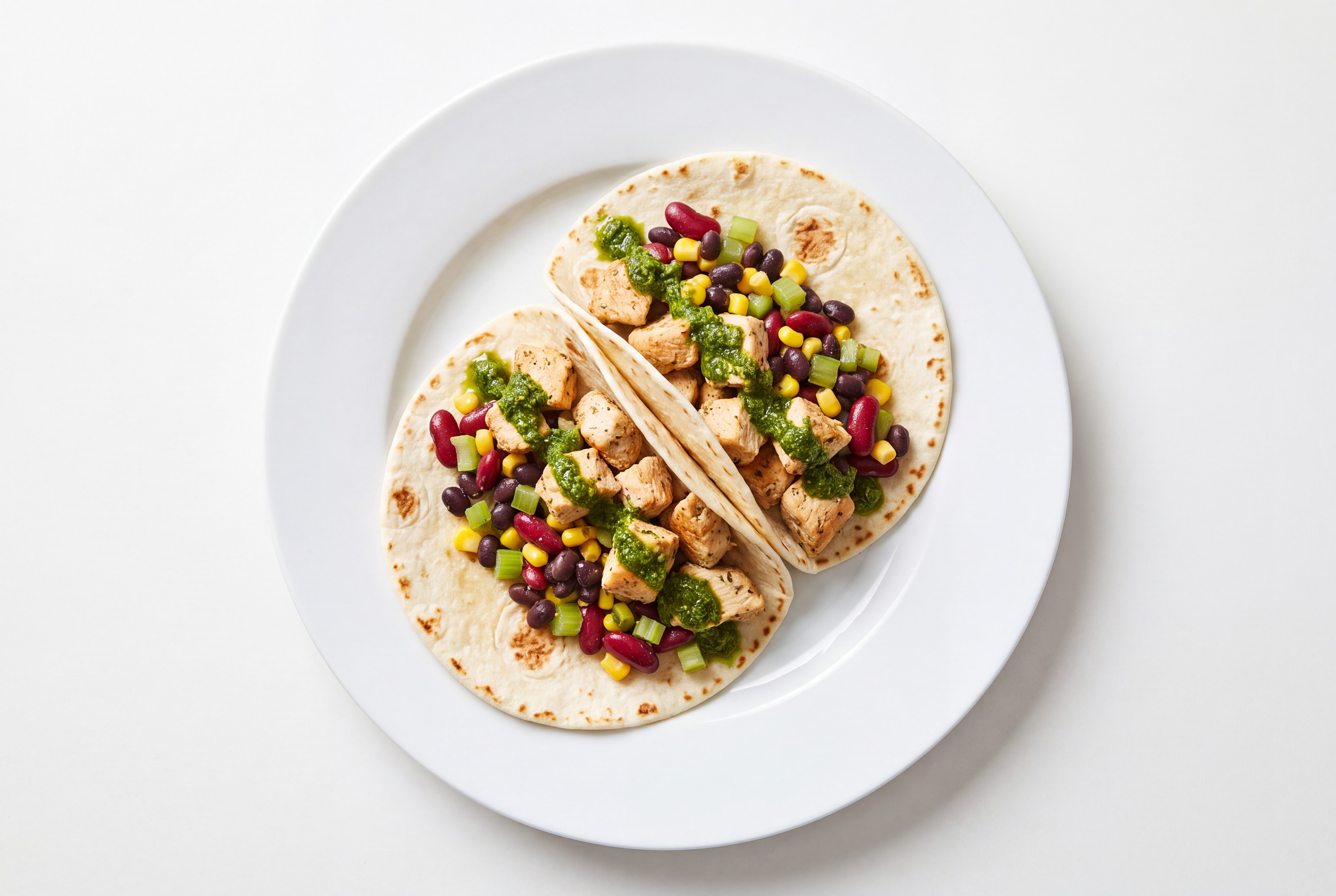 Zhoug Chicken + Bean Tacos