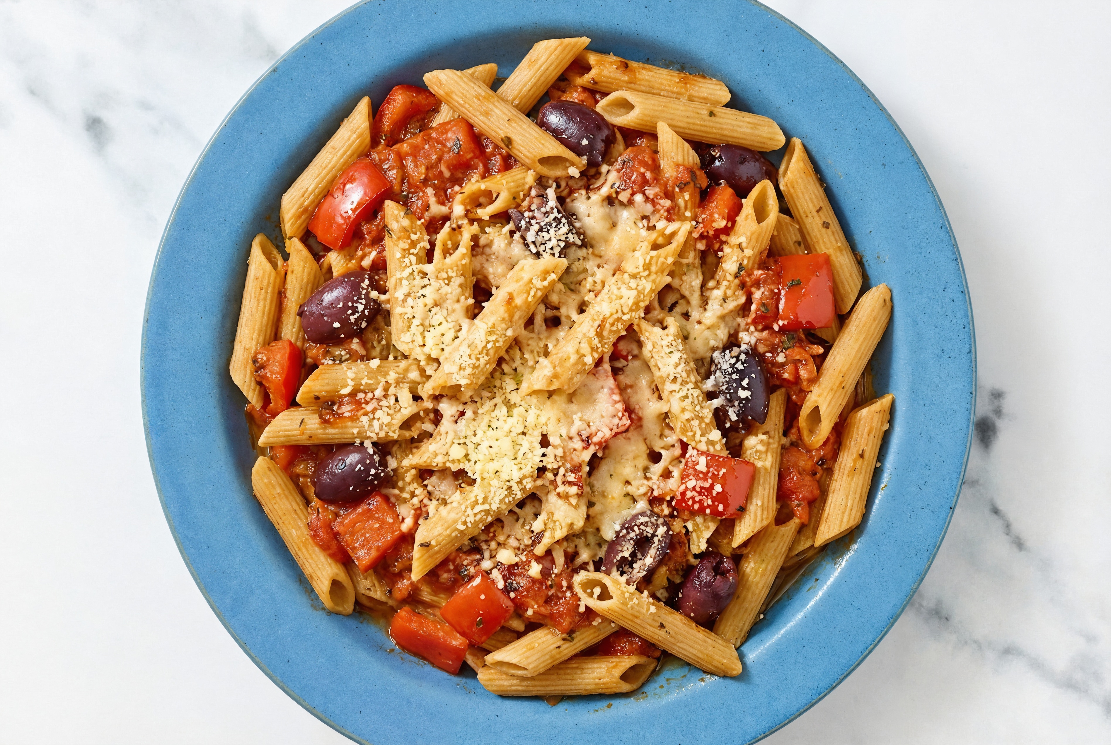 Herby Olive Marinara Pasta Bake with Grated Parmesan Cheese