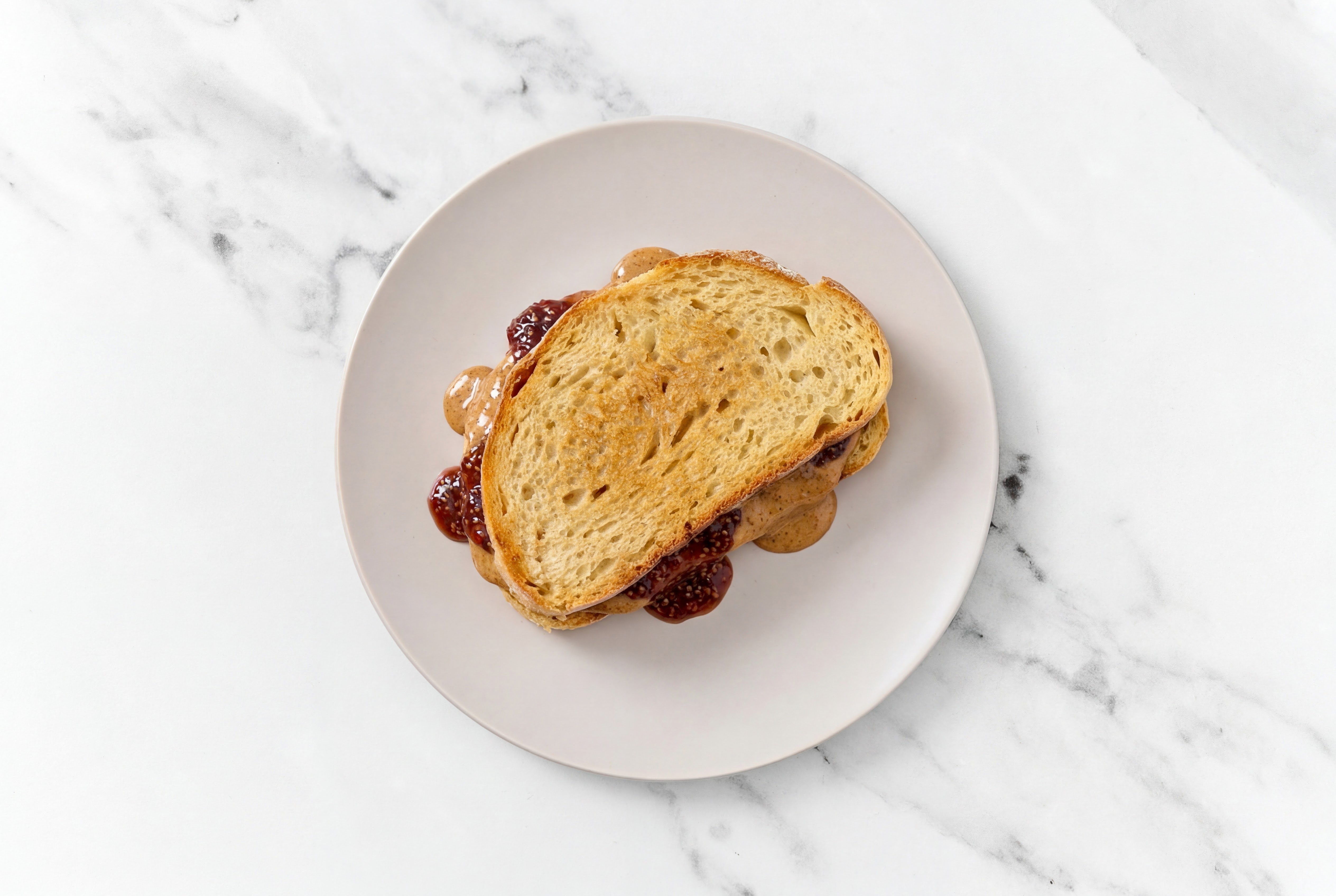Almond Butter + Strawberry Jam Sourdough Sandwich