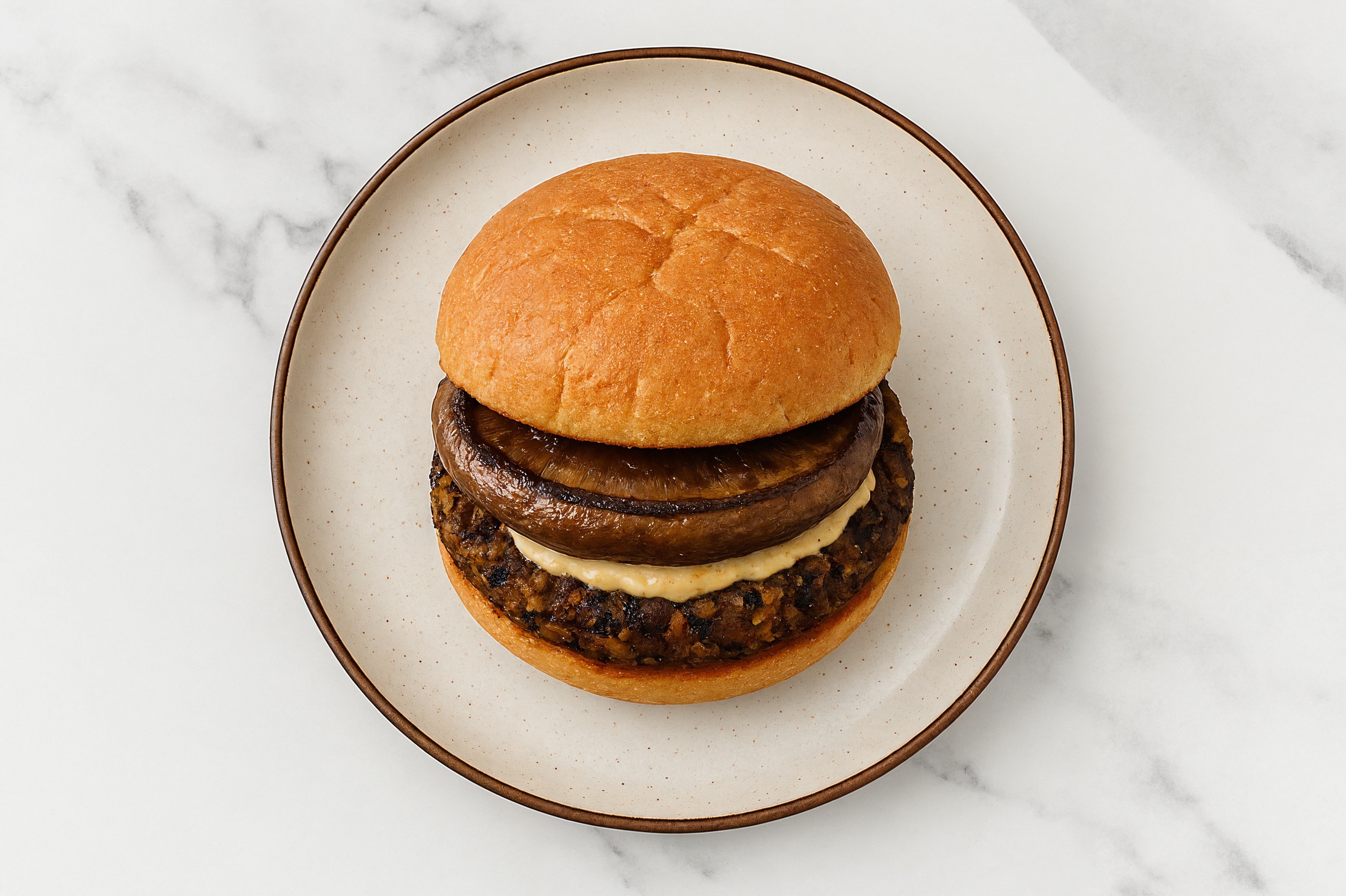 Portabella Black Bean Burger on GF Bun with French Onion Sauce