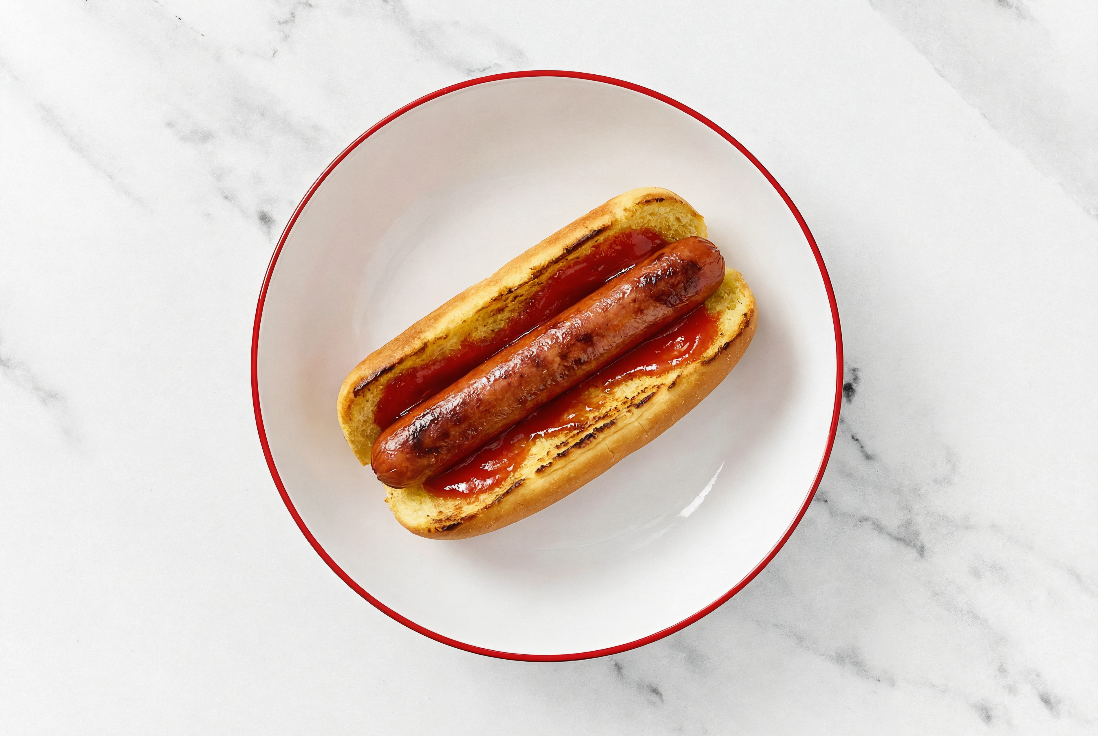 Beef Hot Dog with Ketchup on Brioche