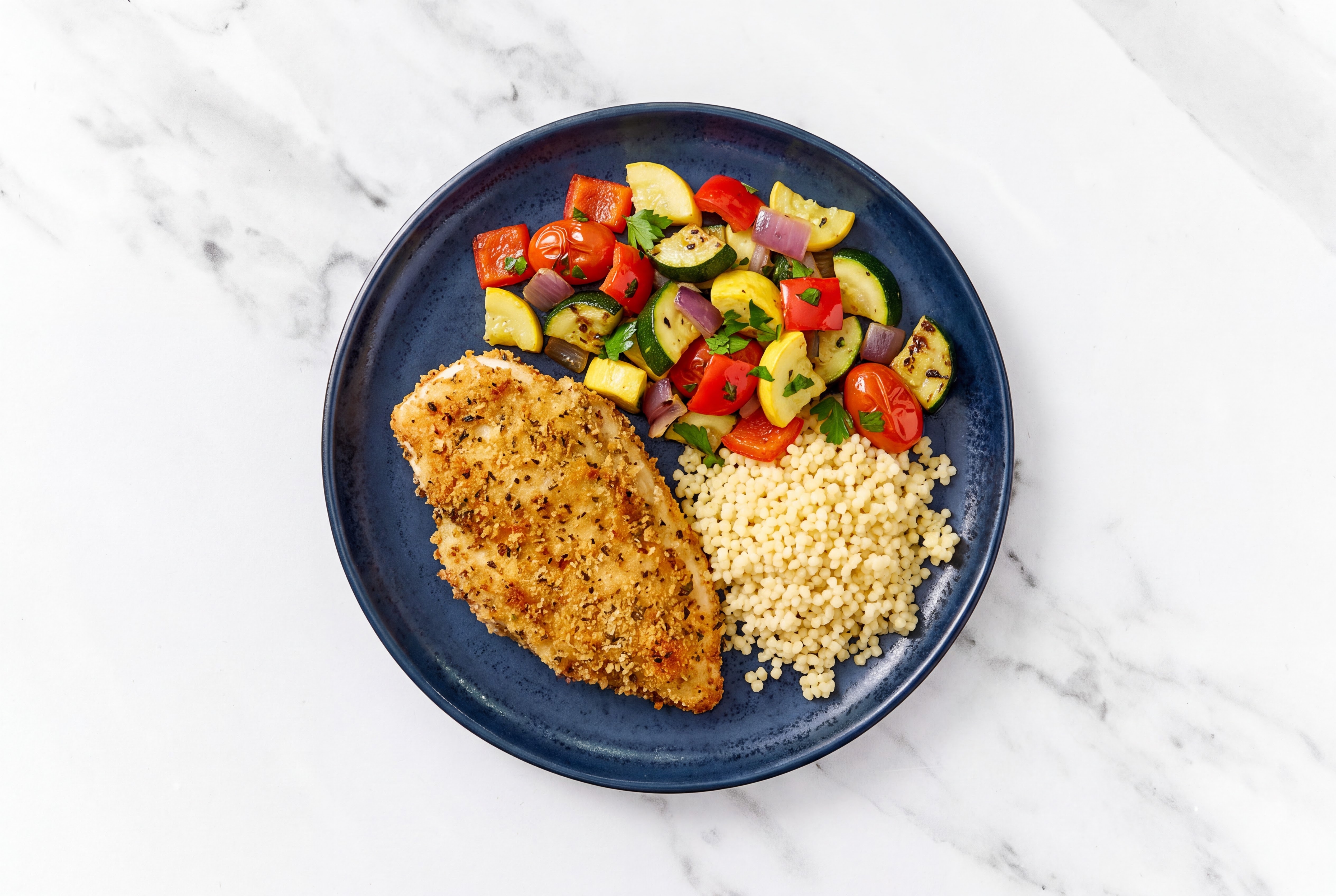 Parmesan Breaded Chicken Cutlet with Squash Skillet & Couscous