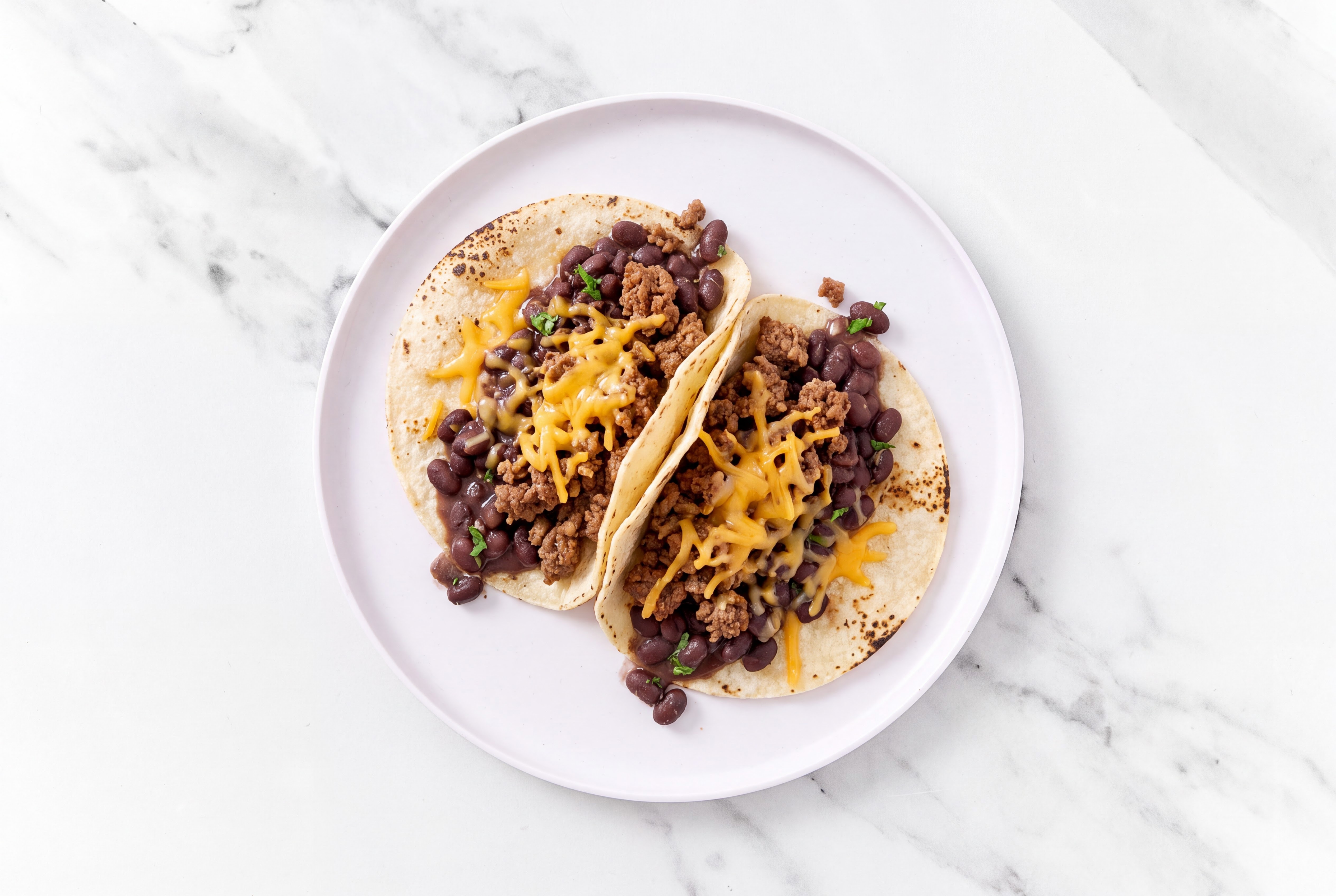 Hearty Ground 93/7 Lean Beef Tacos with Cheddar Cheese & Spiced Beans