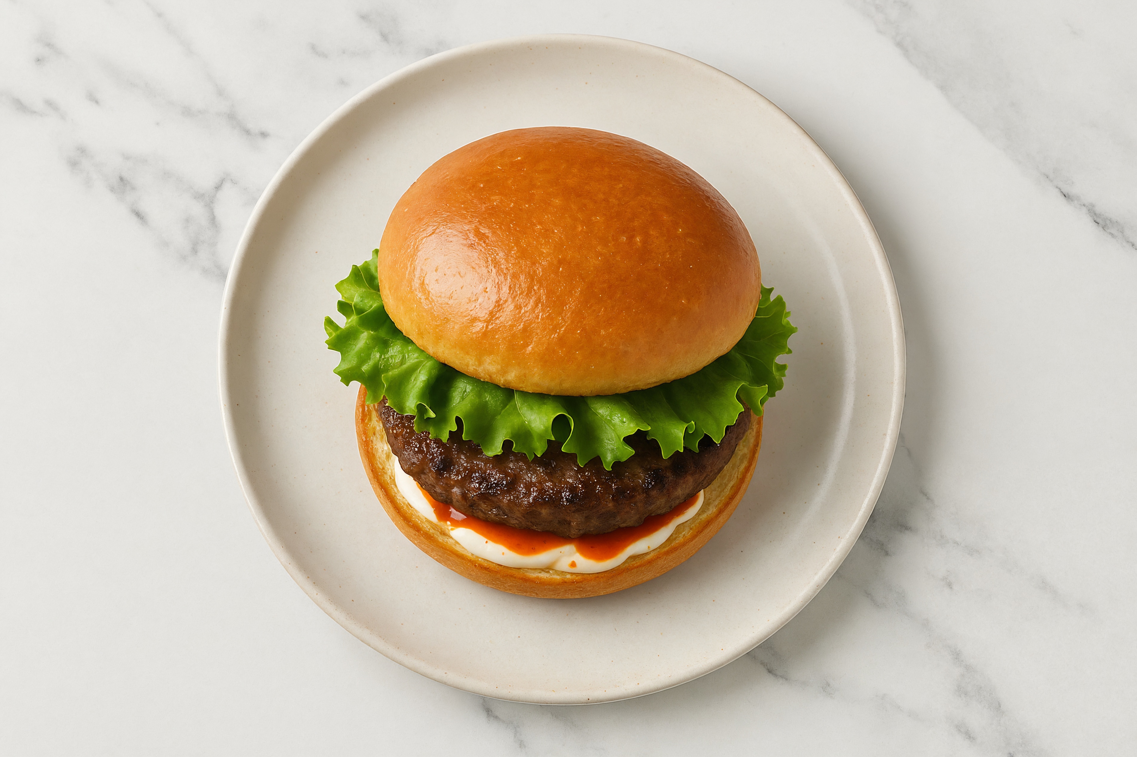Beef Burger on Brioche with Spicy Mayo with Lettuce with Sriracha Hot Sauce