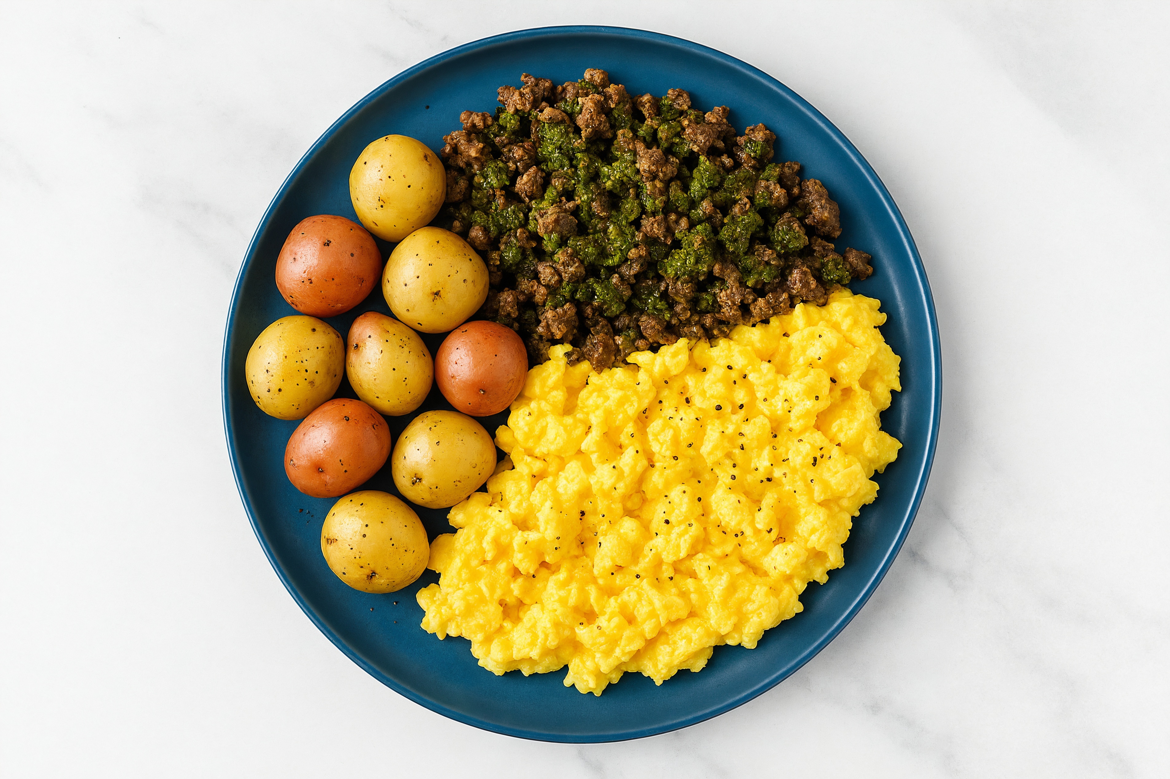 Eggs + Chimichurri Tavern Beef Burger Plate with Multicolor Potatoes
