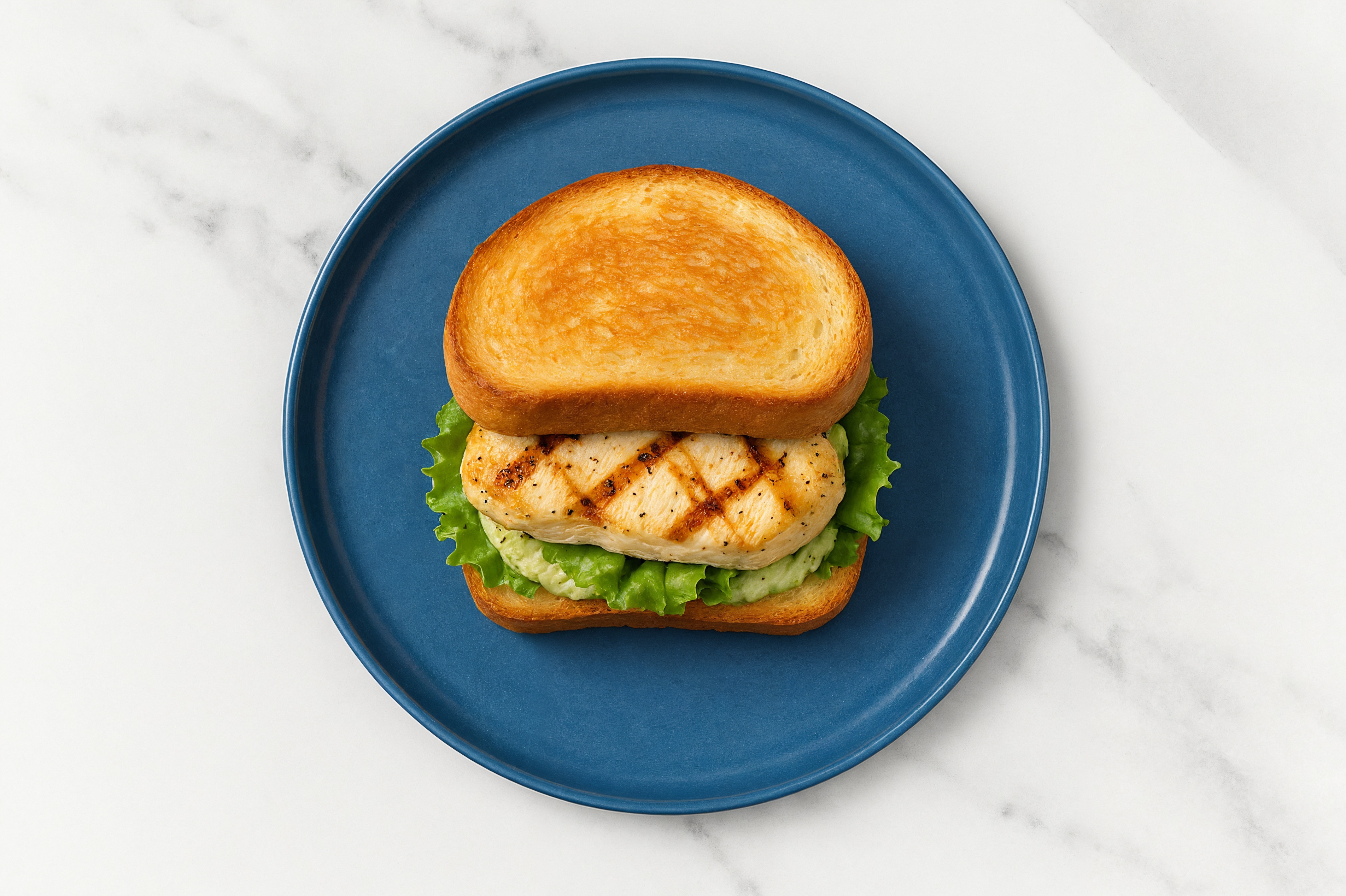 Creamy Artichoke Grilled Chicken Sandwich with Green Leaf Lettuce on Honey White Bread