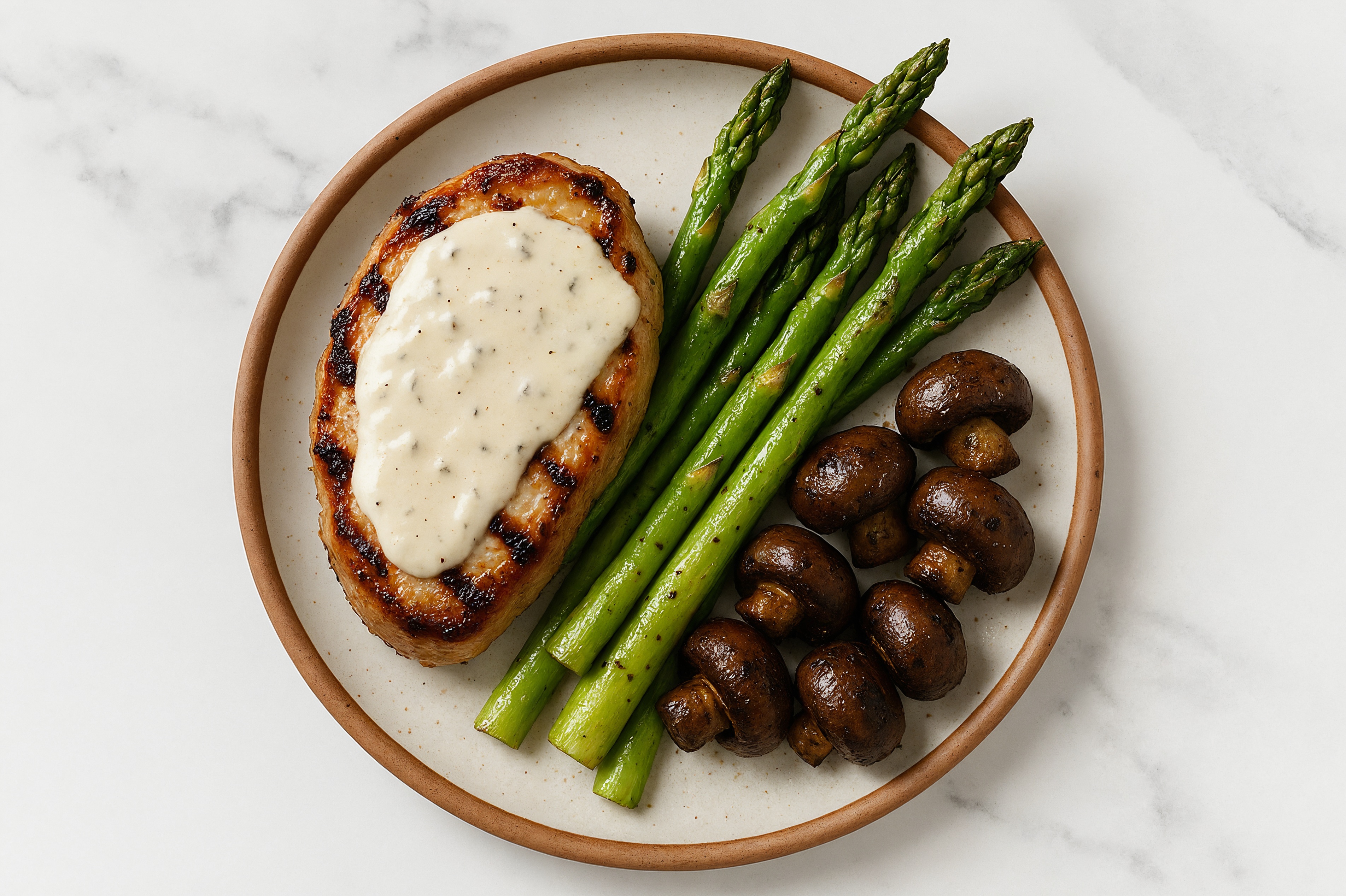 Creamy Parmesan Smothered Pork Chops with Asparagus & Roasted Mushrooms