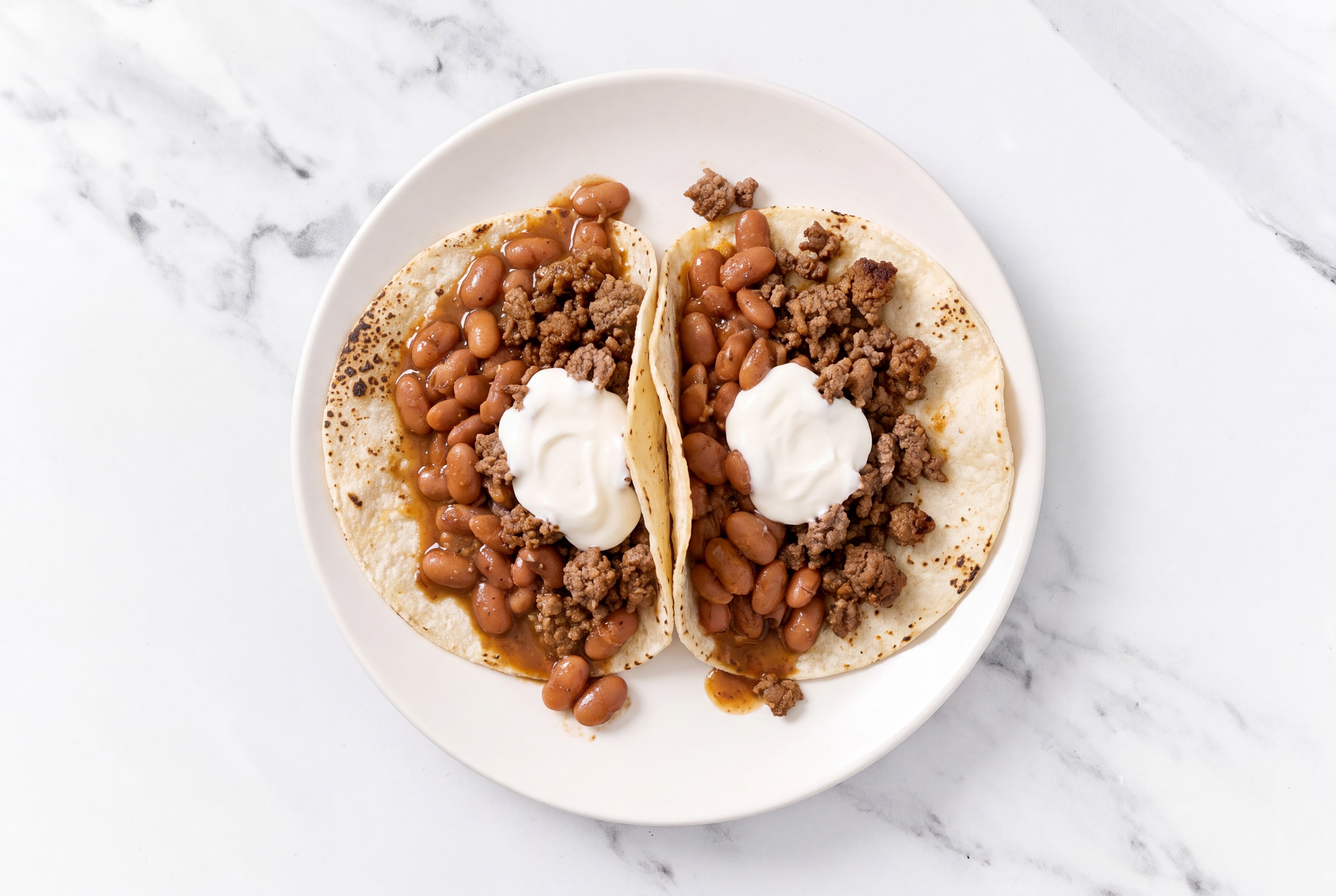 Hearty Ground 93/7 Lean Beef Tacos with Crema & Pinto Beans