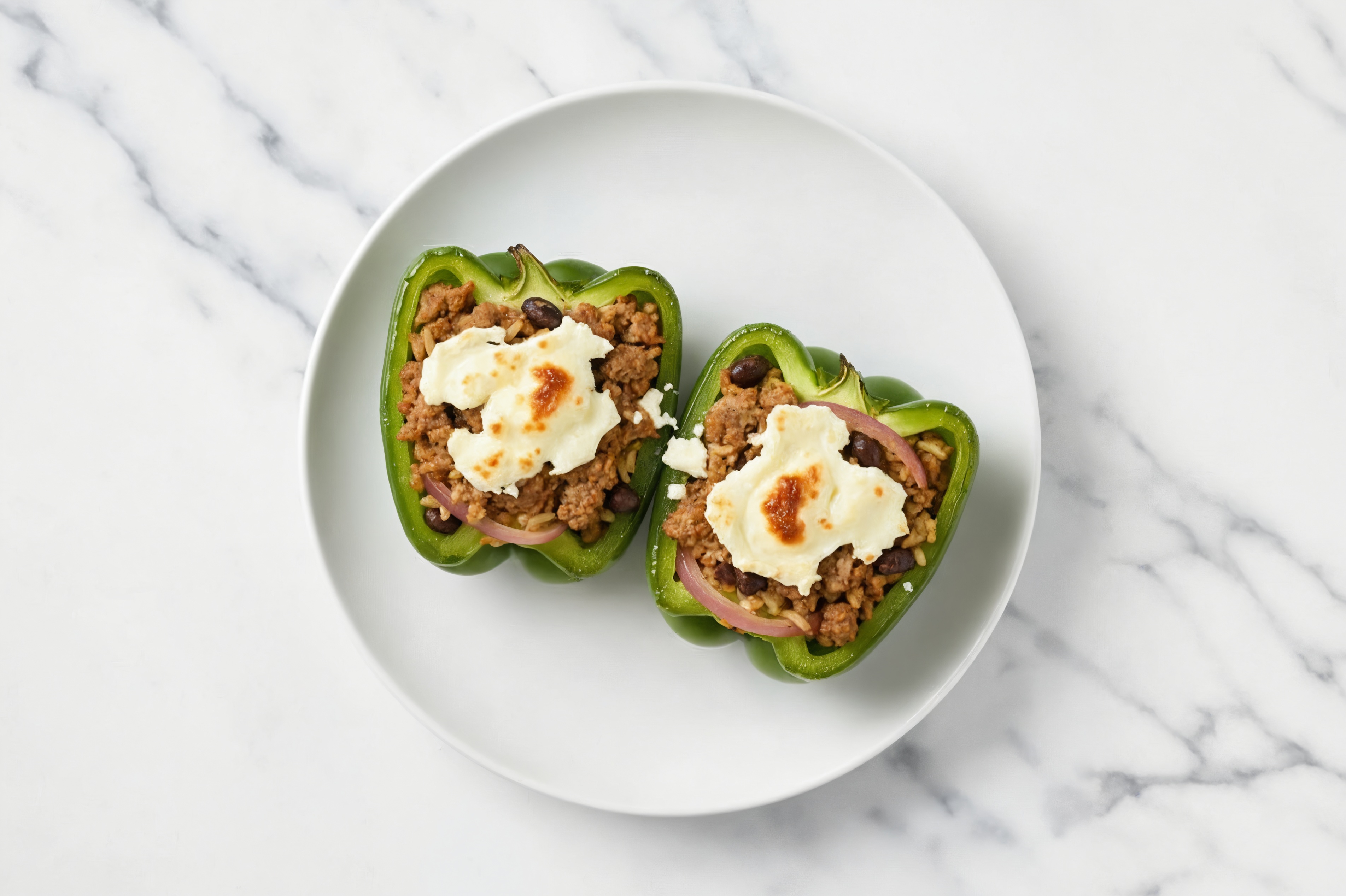 Ground Lamb + Goat Cheese Stuffed Peppers with Seasoned White Rice + Black Beans