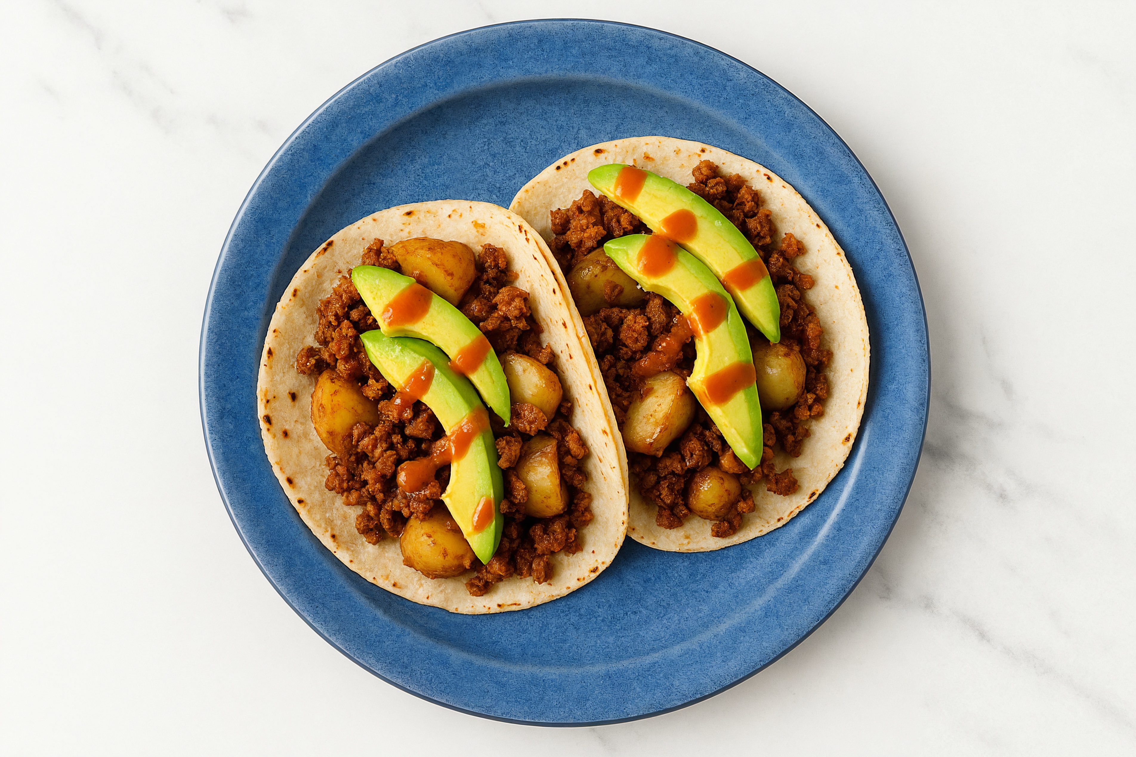 Spicy Chorizo + Potato Tacos with Sriracha Hot Sauce