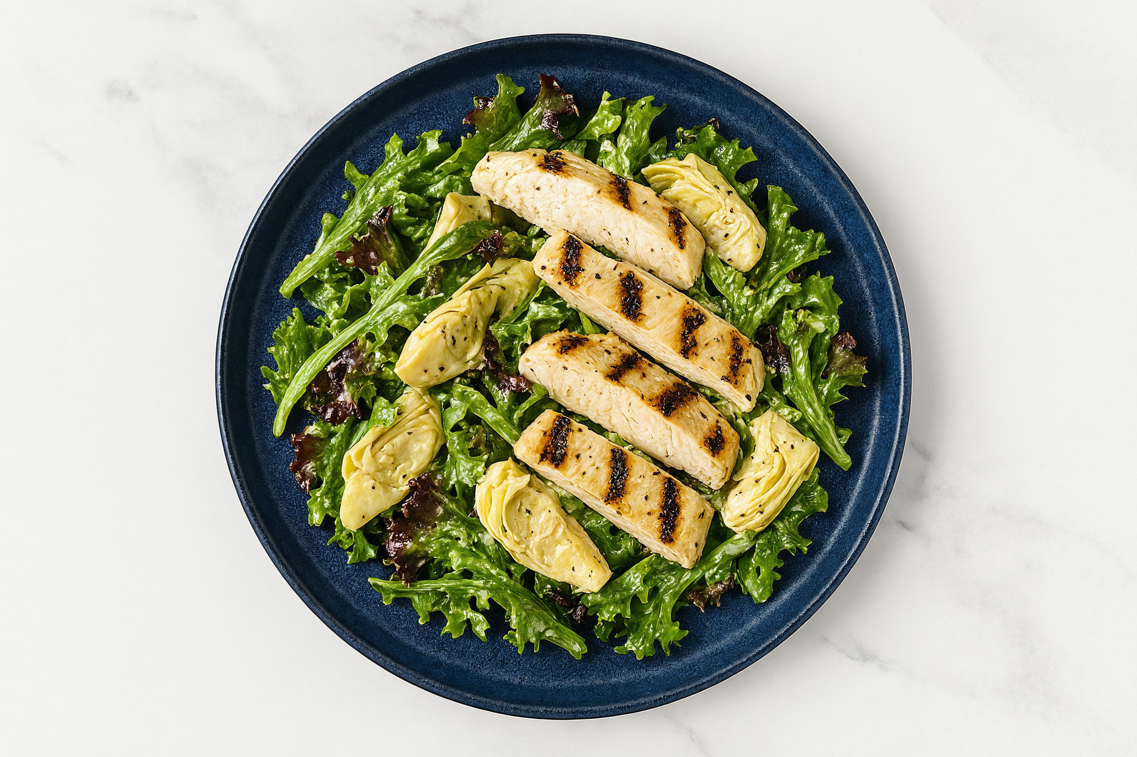 Sweet Spring Mix Seasoned Grilled Chicken Breast Salad with Marinated Artichoke Hearts + Vegan Caesar Dressing
