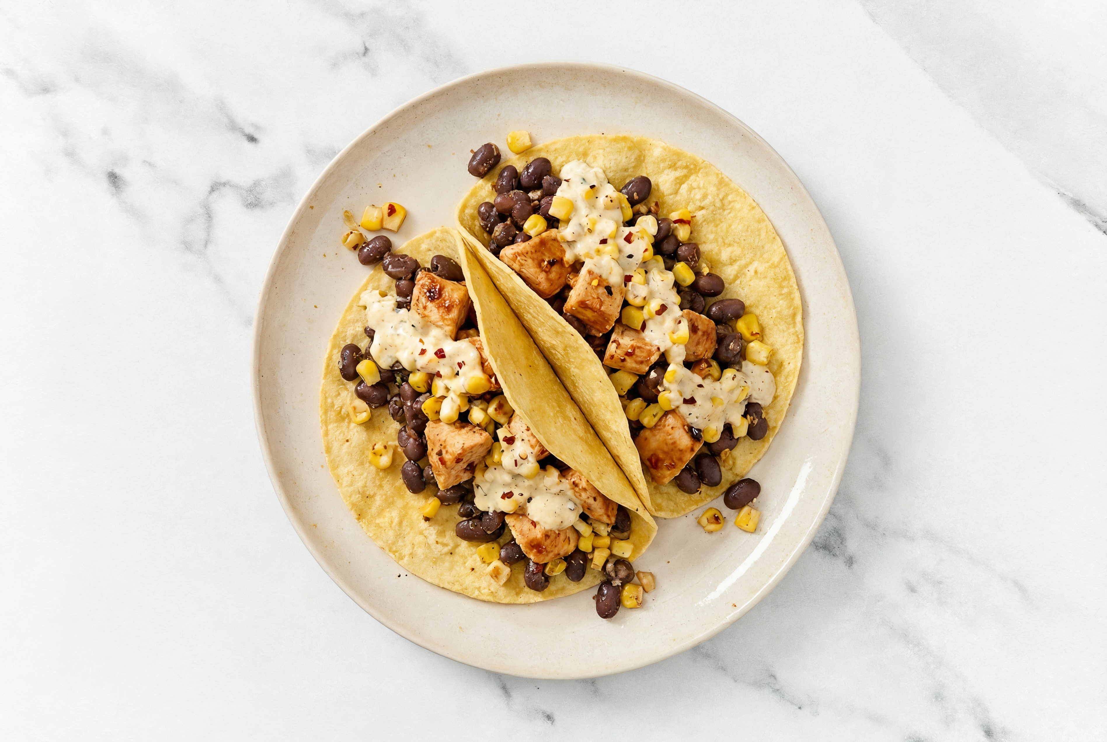 Chipotle Chicken Tacos with Street Corn + Wheat Tortillas Sauce & Spiced Beans