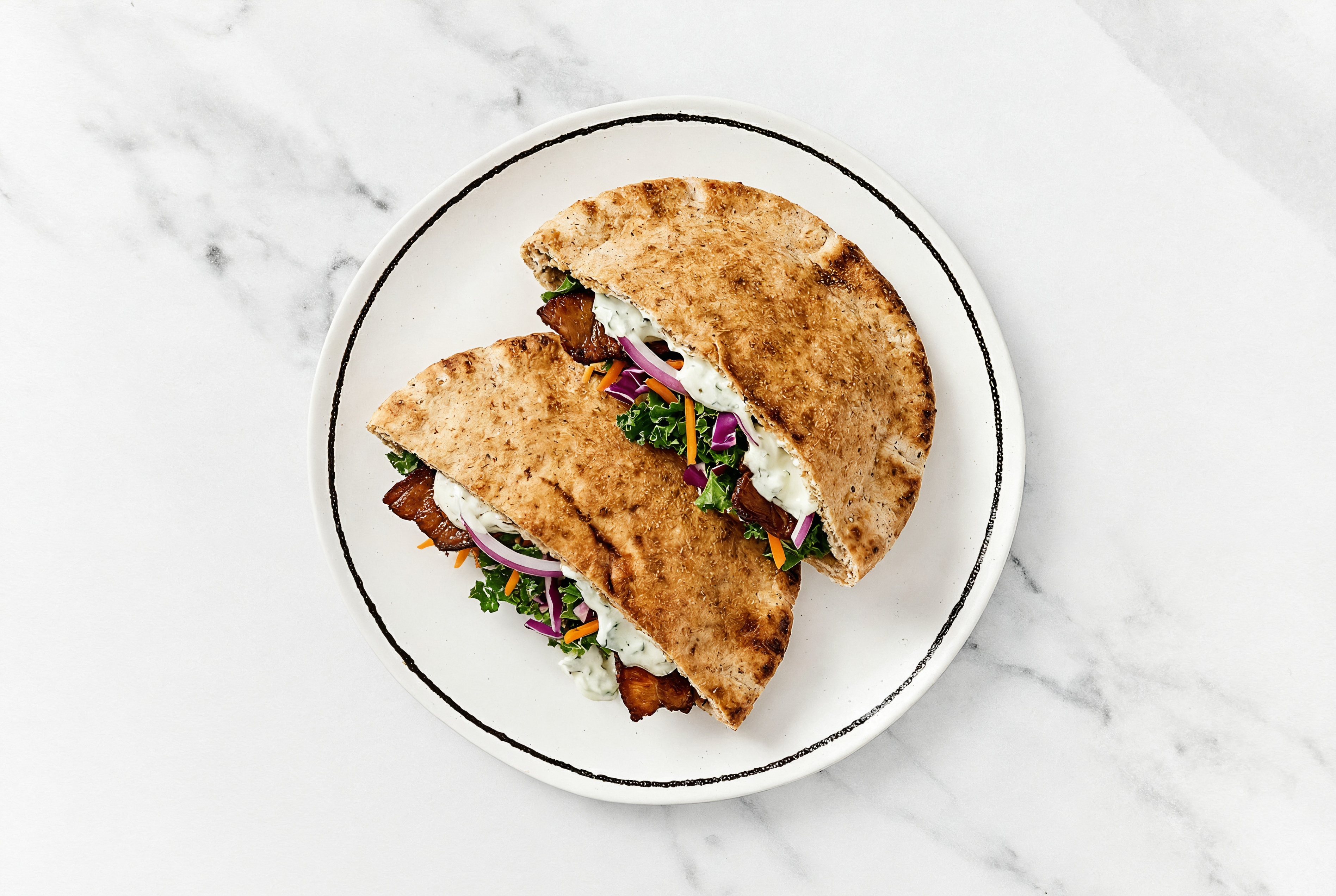 Plant Based Bacon Gyro-Style Sandwich with Traditional Pita