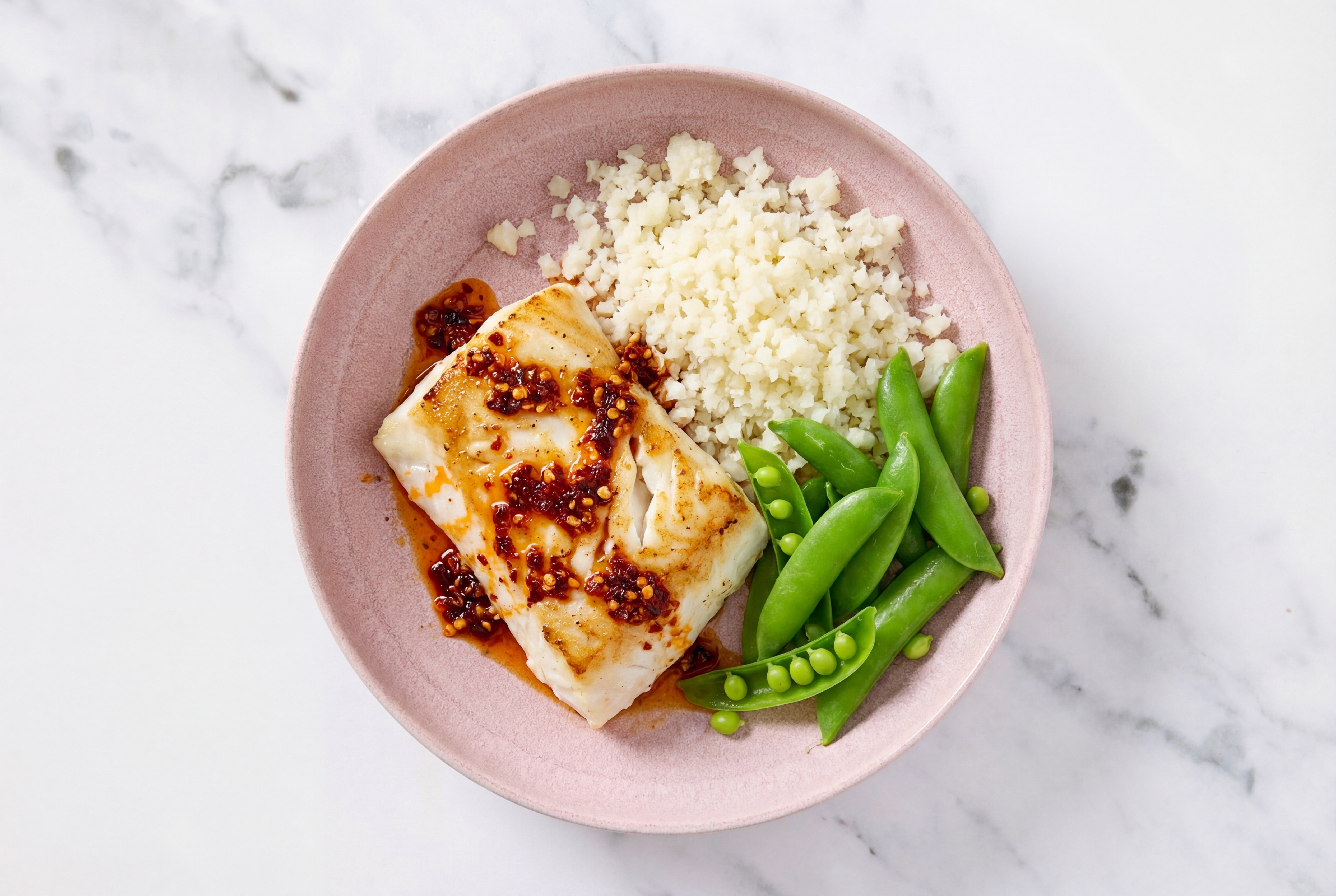 Chili Crisp Barramundi Rice Bowl with Riced Cauliflower