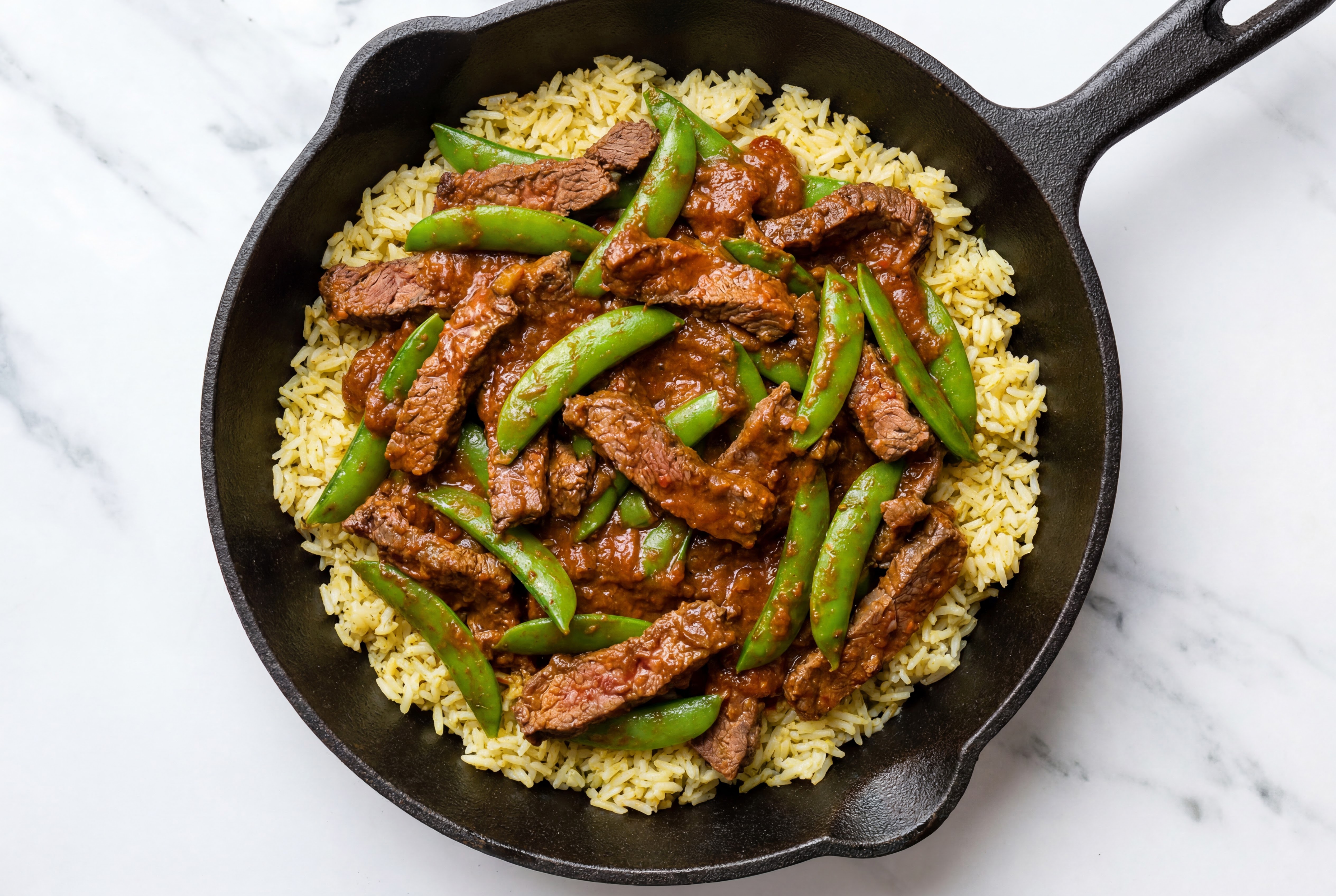 Spicy Vindaloo Beef Sirloin Stir-Fry with Snap Peas over Jasmine Rice