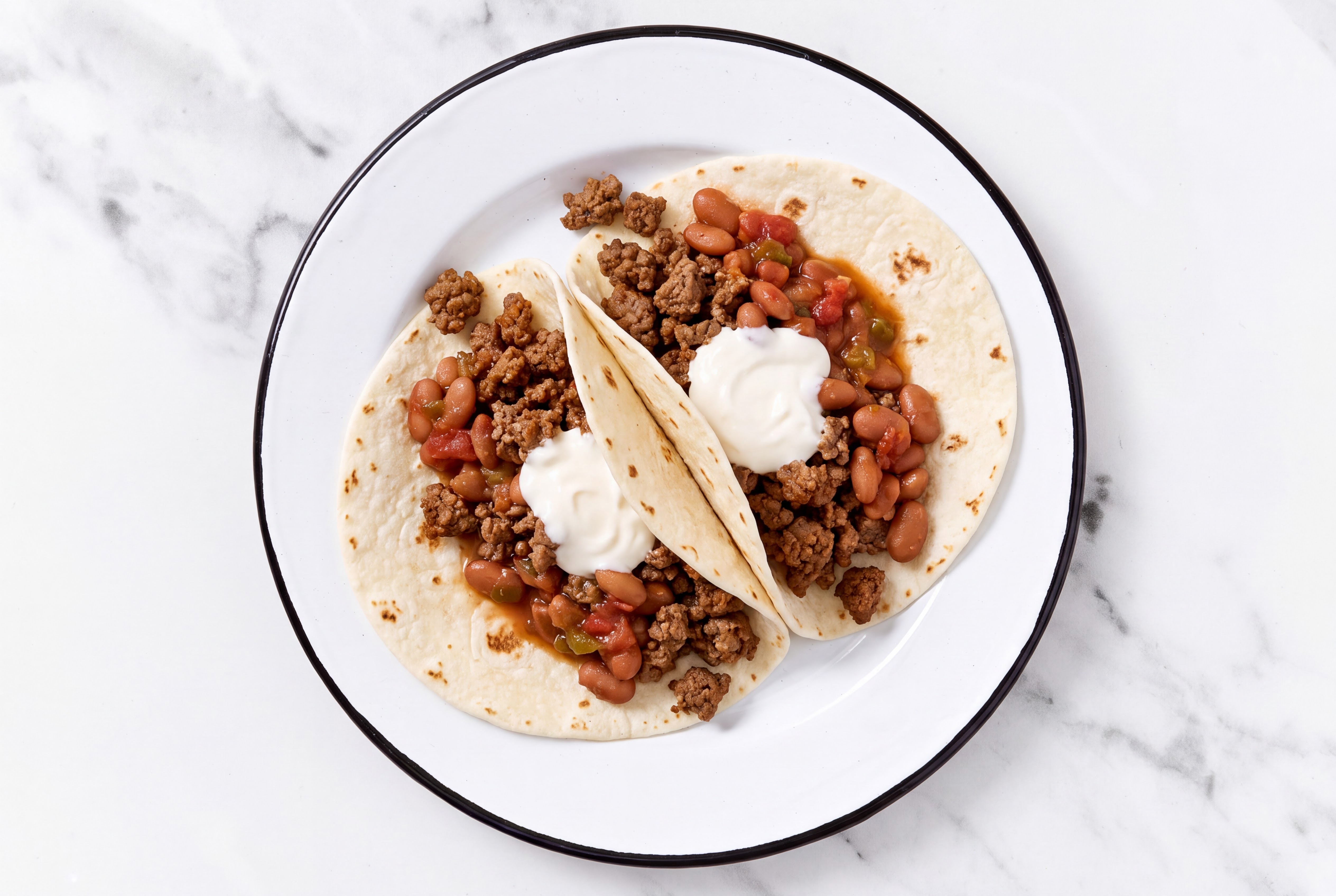 Ground 93/7 Lean Beef Tacos with Crema & Pinto Beans