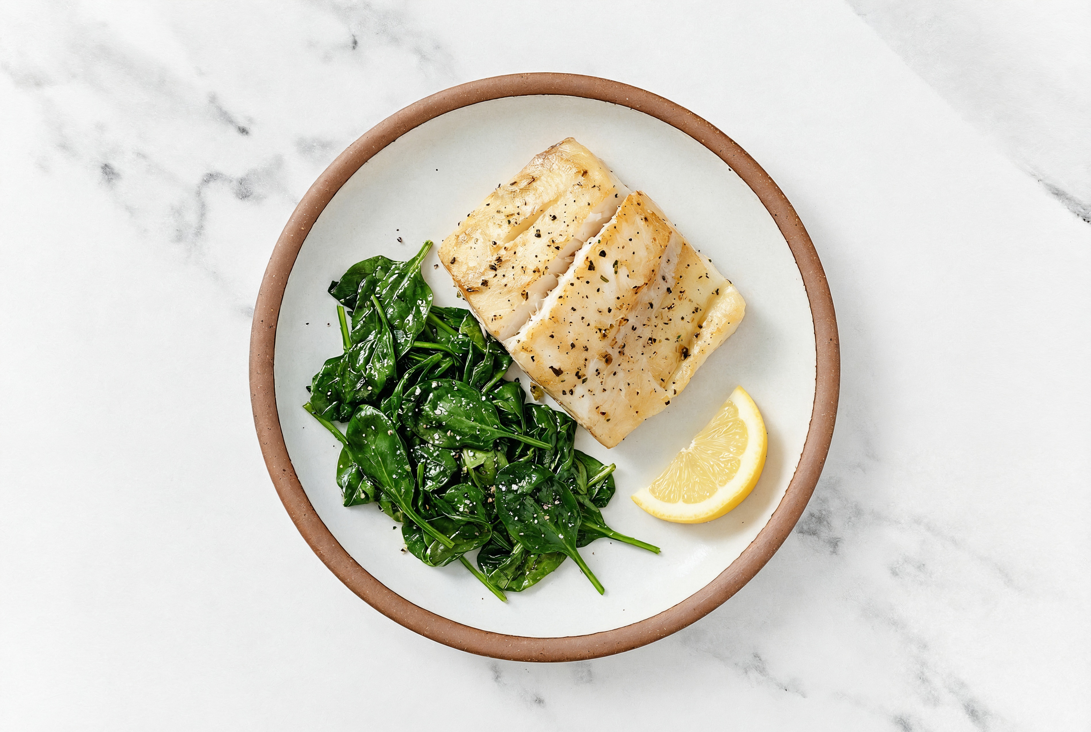 Garlic Herb Crusted Barramundi + Lemony Sautéed Baby Spinach