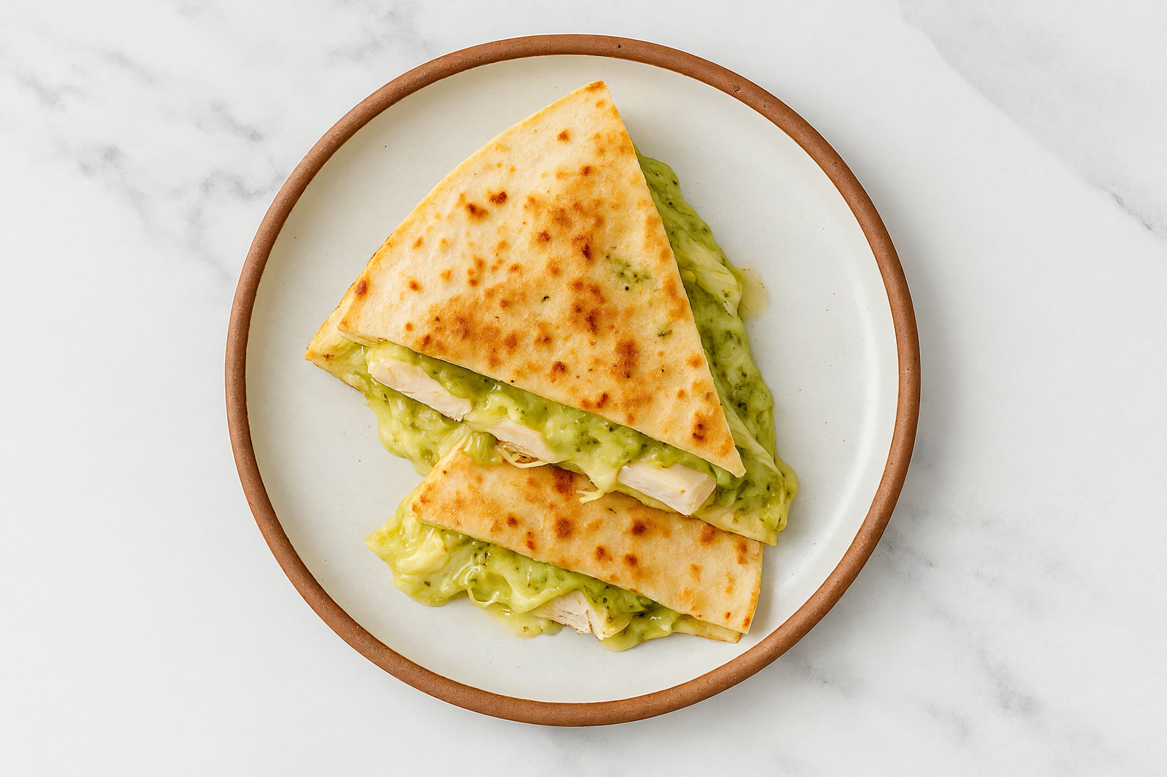 Pesto Chicken Quesadilla with Shredded Mozzarella Cheese