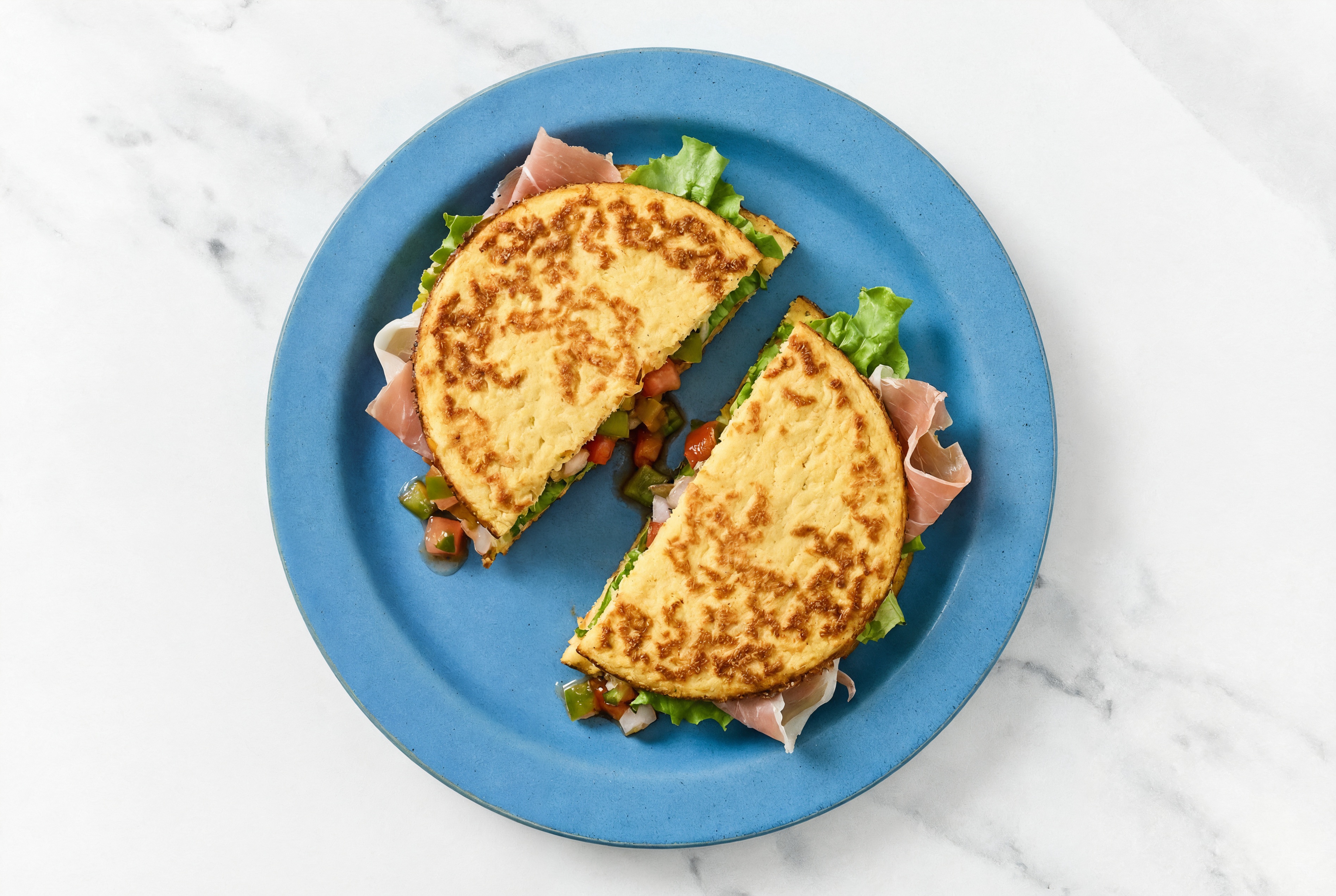Mexican Prosciutto Sandwich with Green Leaf Lettuce on Cauliflower Rounds