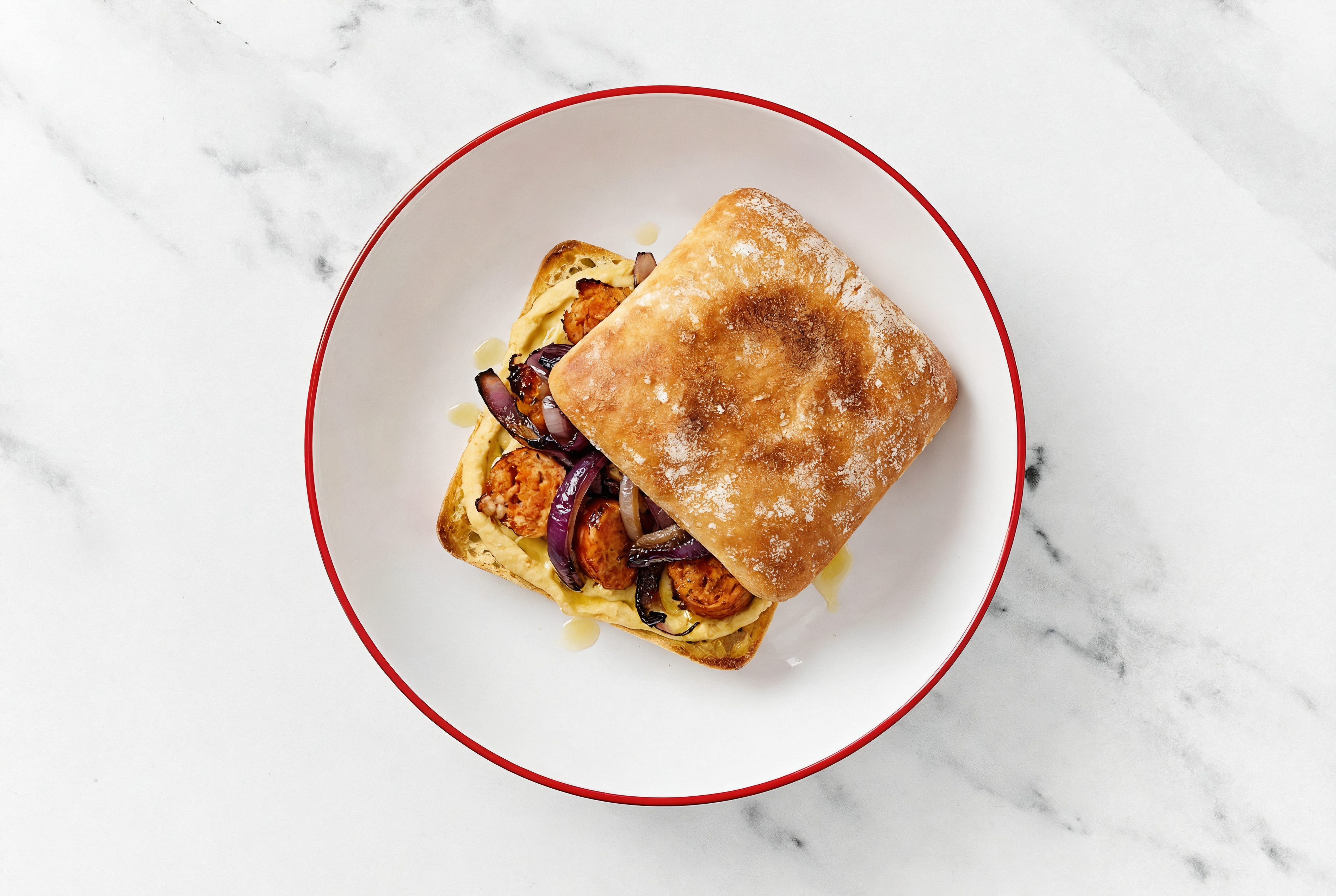 Grilled Hot Sausage French Onion Hummus Toast