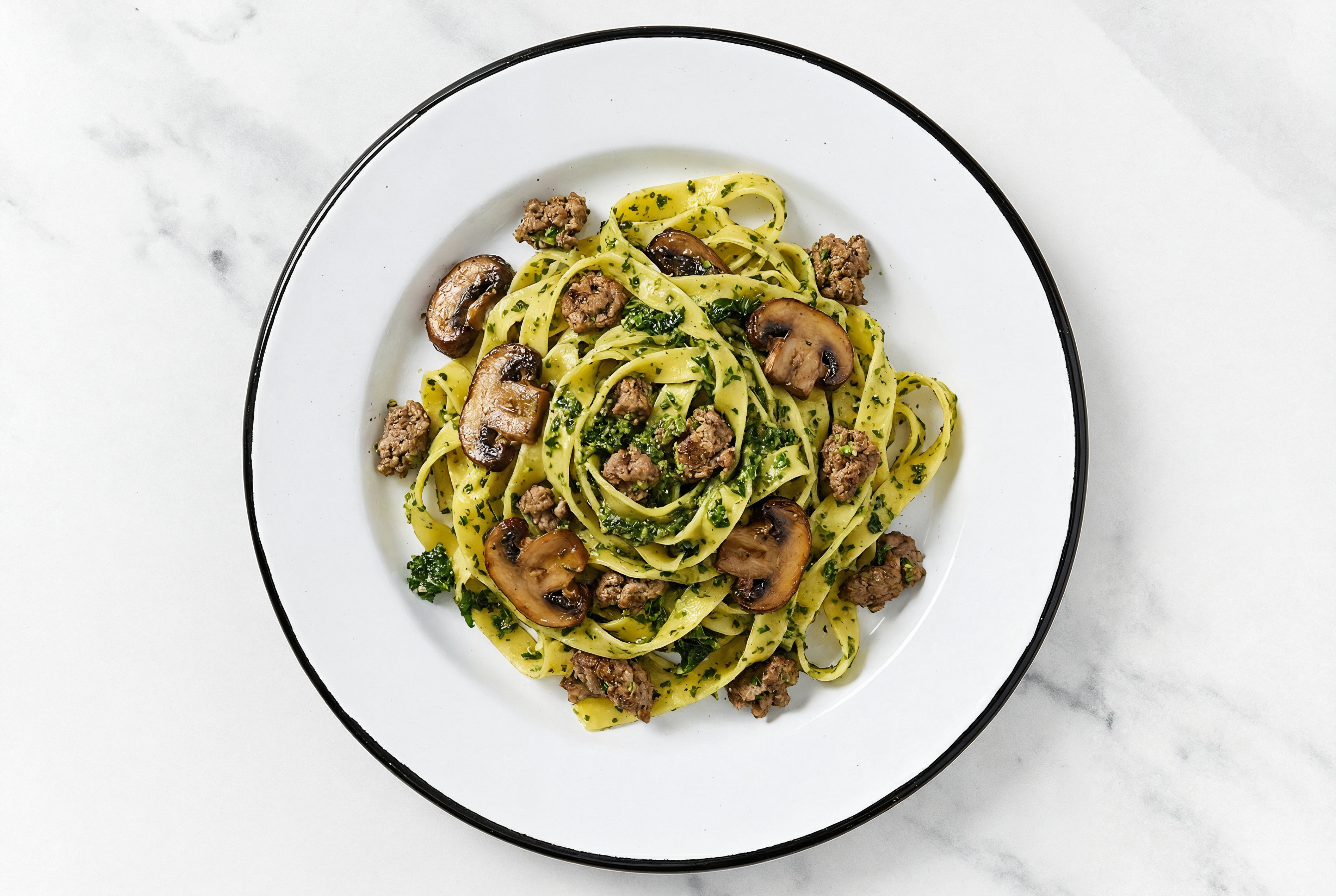 Tagliatelle Kale Pesto with Ground Bison & Mushrooms