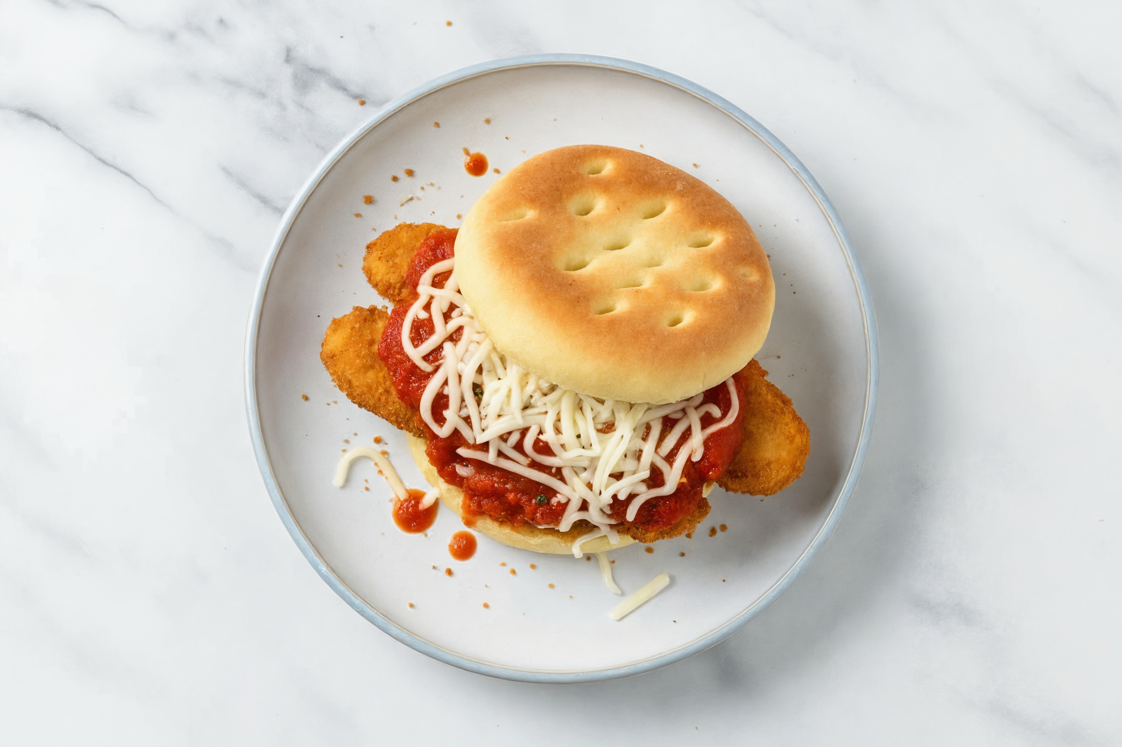 Herby "Chicken" Tender Marinara Mozz Sandwich with Shredded Mozzarella Cheese