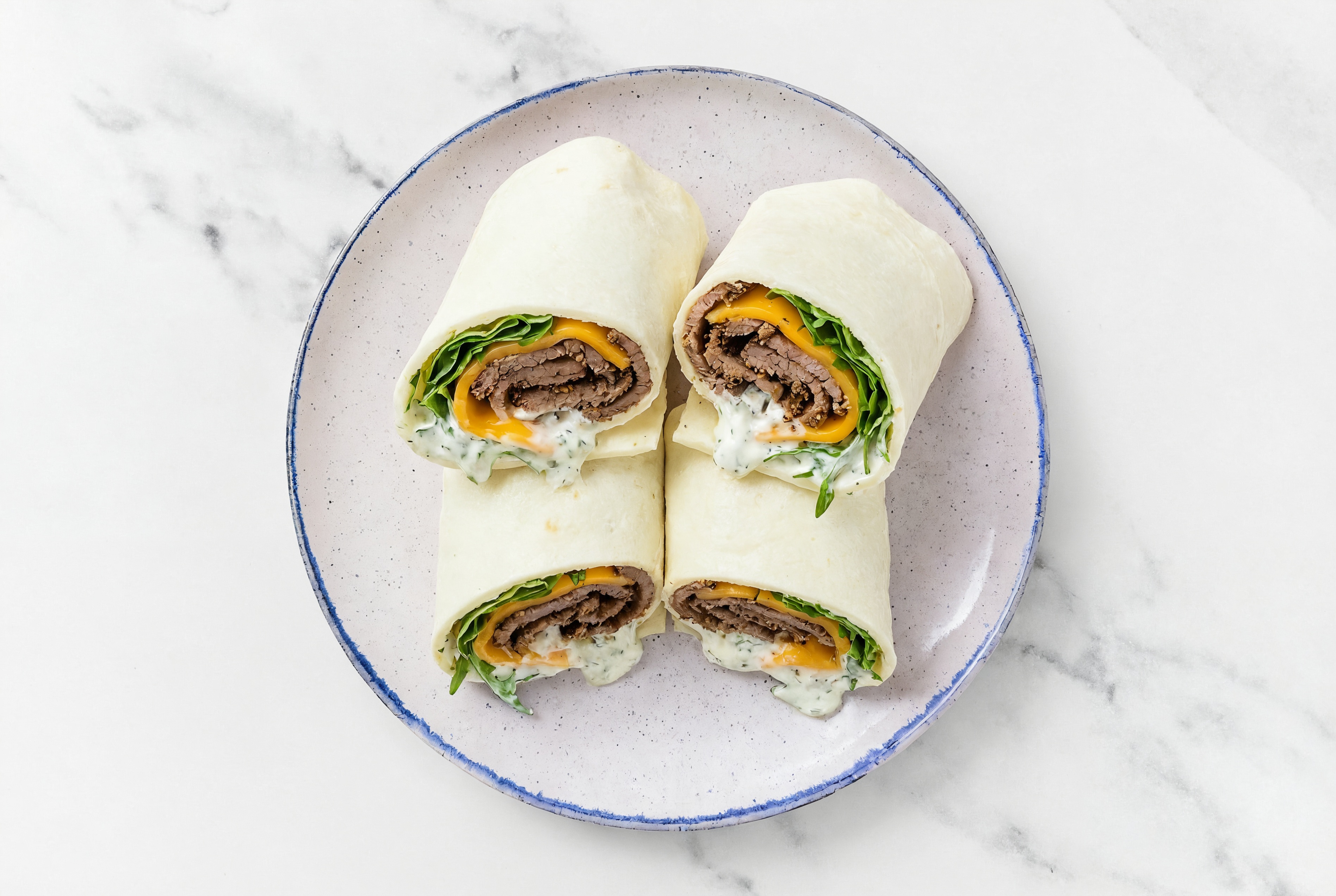 Creamy Roast Beef + Cheddar Wraps with Arugula