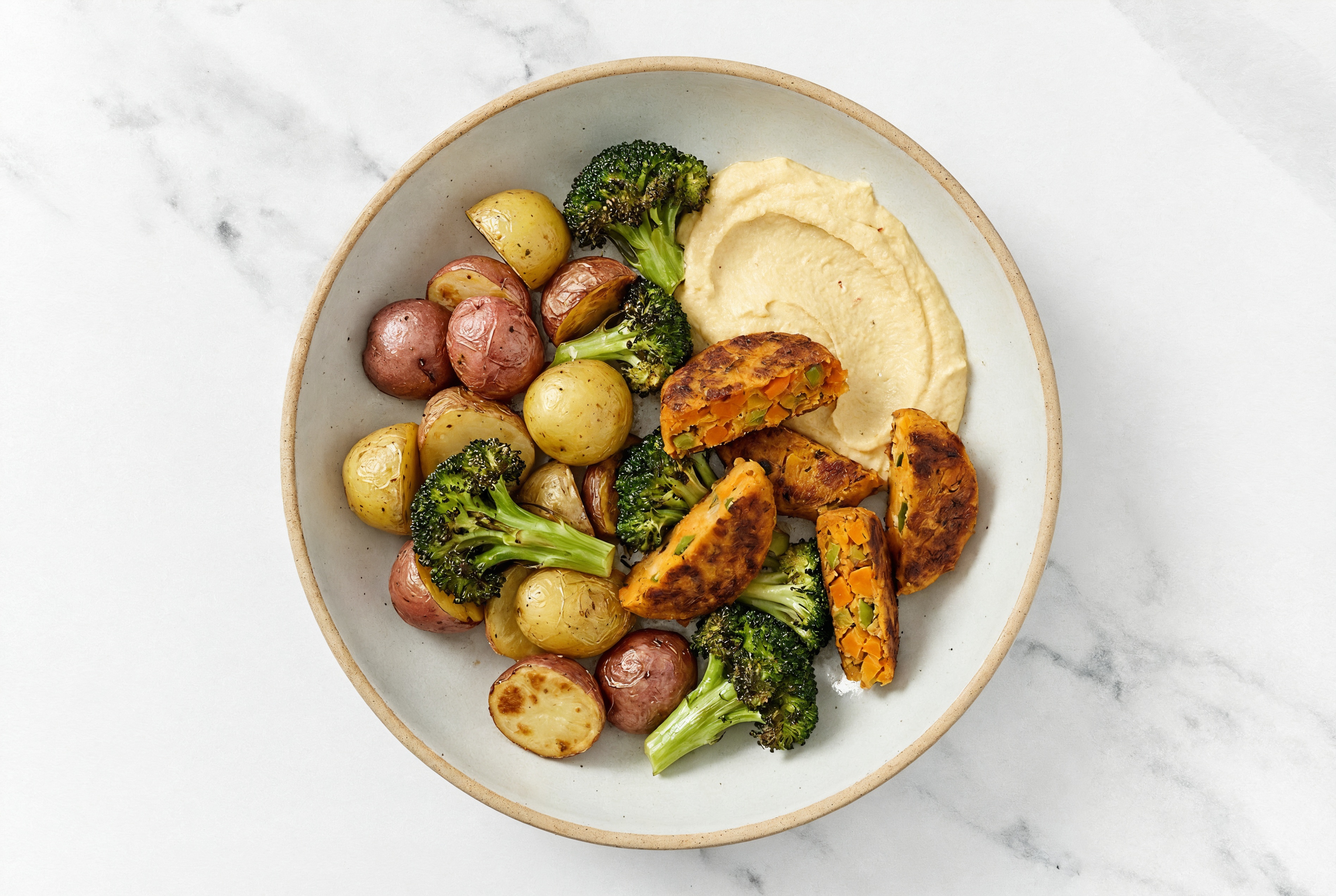 Herby Sweet Potato Veggie Burger Lemon Garlic Hummus Bowl