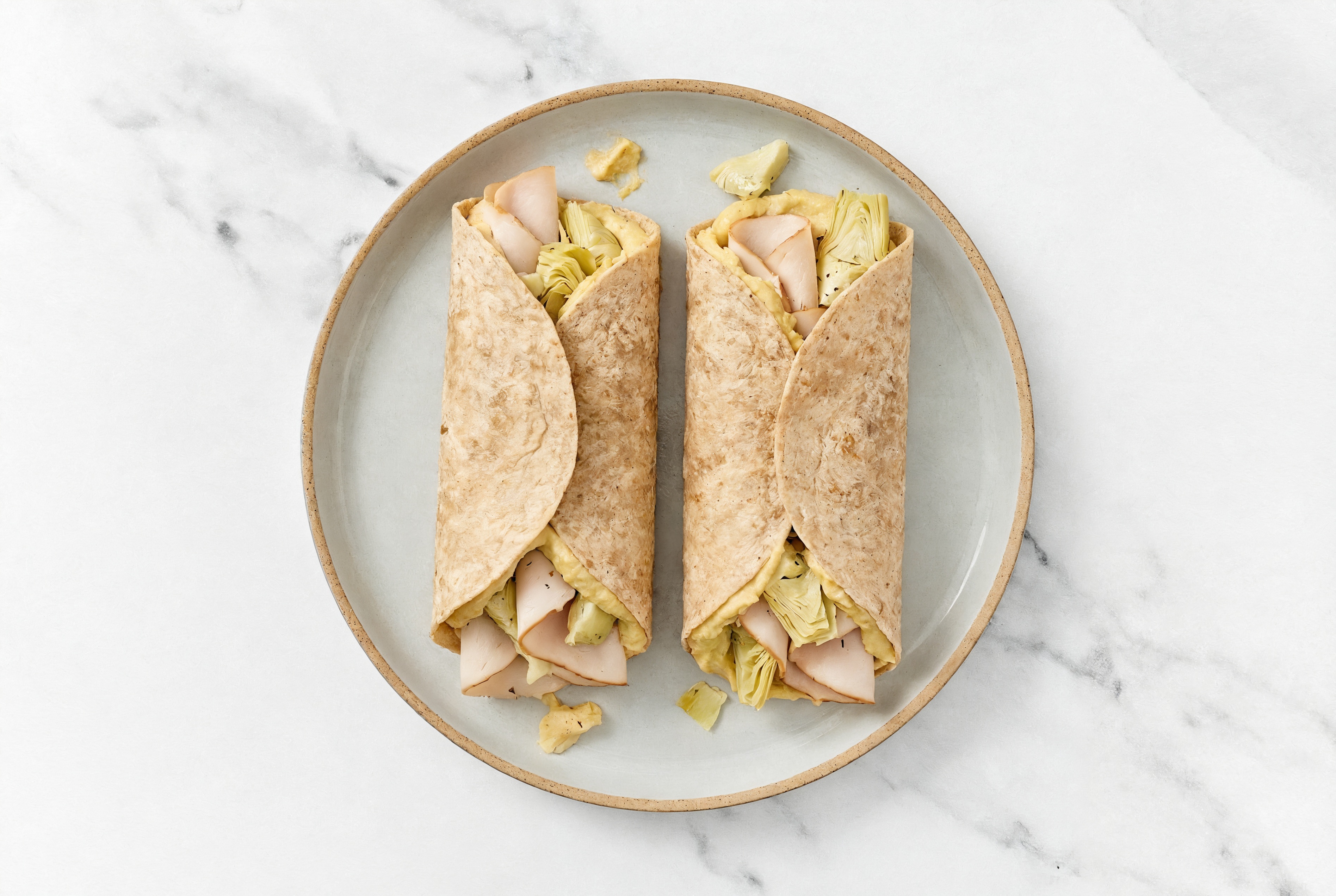 Savory Mediterranean-Inspired Oven-Roasted Sliced Turkey Breast + French Onion Hummus Wrap
