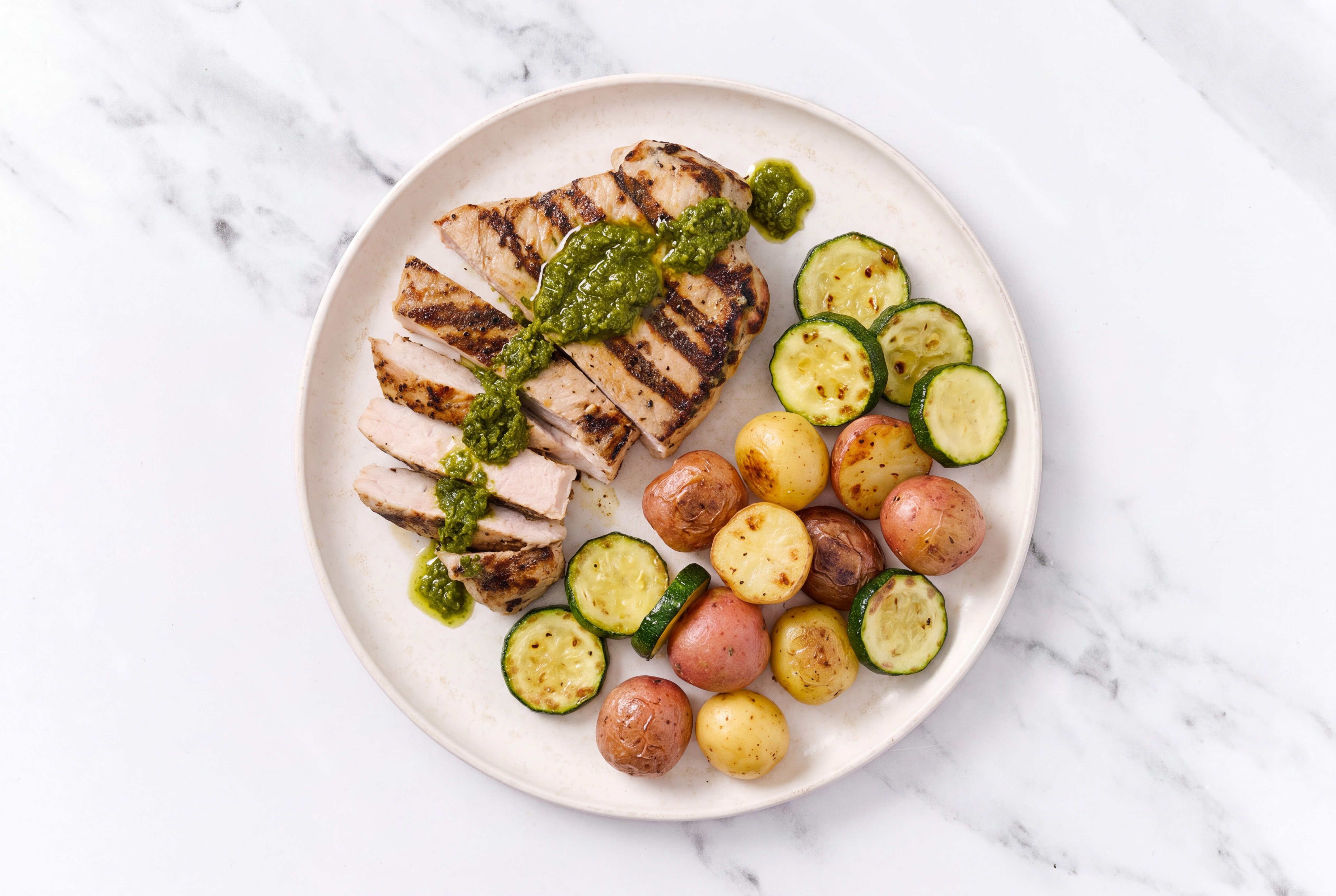 Zhoug Pork Chops + Roasted Potatoes