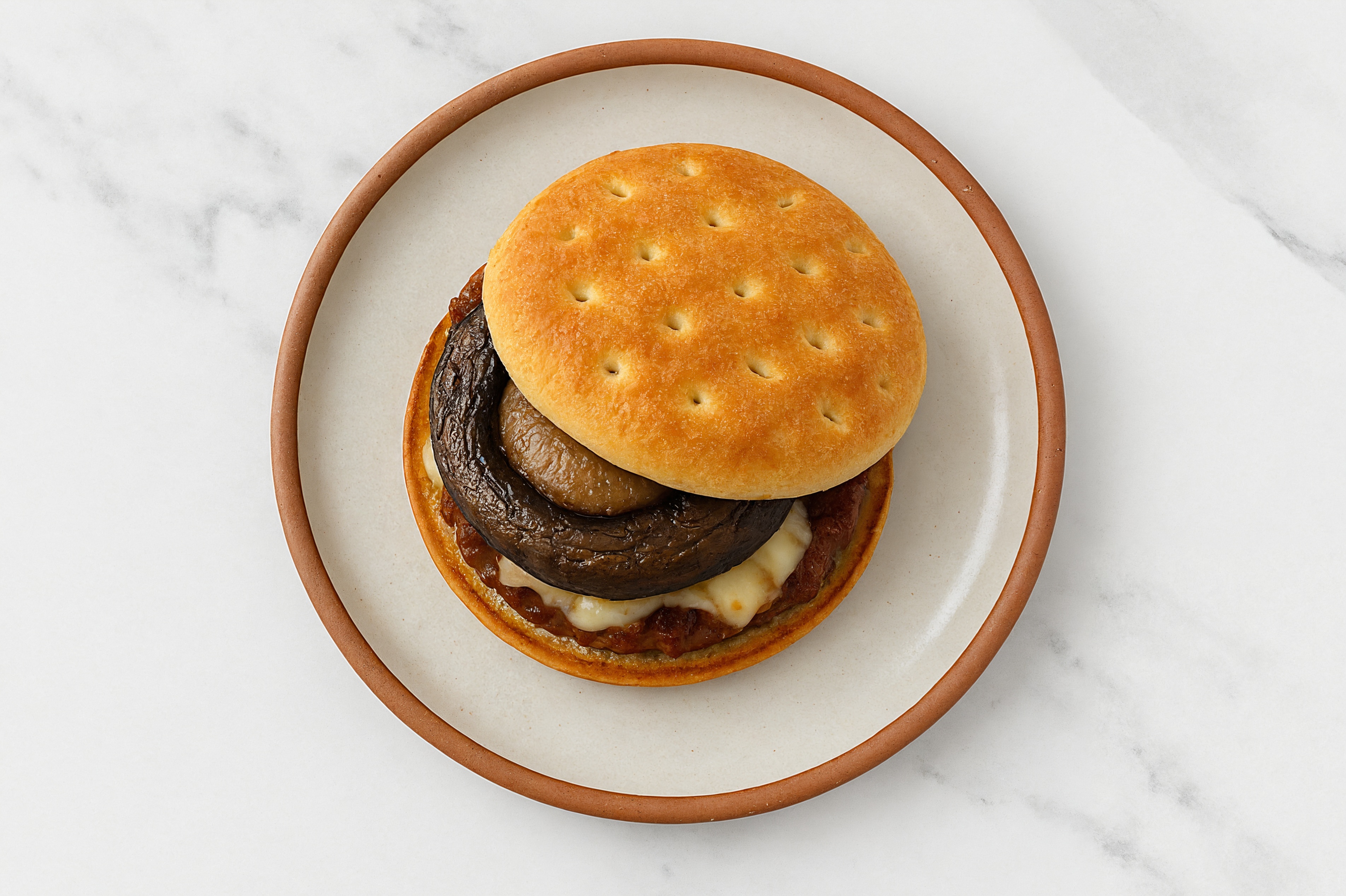 Shroomed Up Brisket Cheeseburger with Shredded Mozzarella Cheese