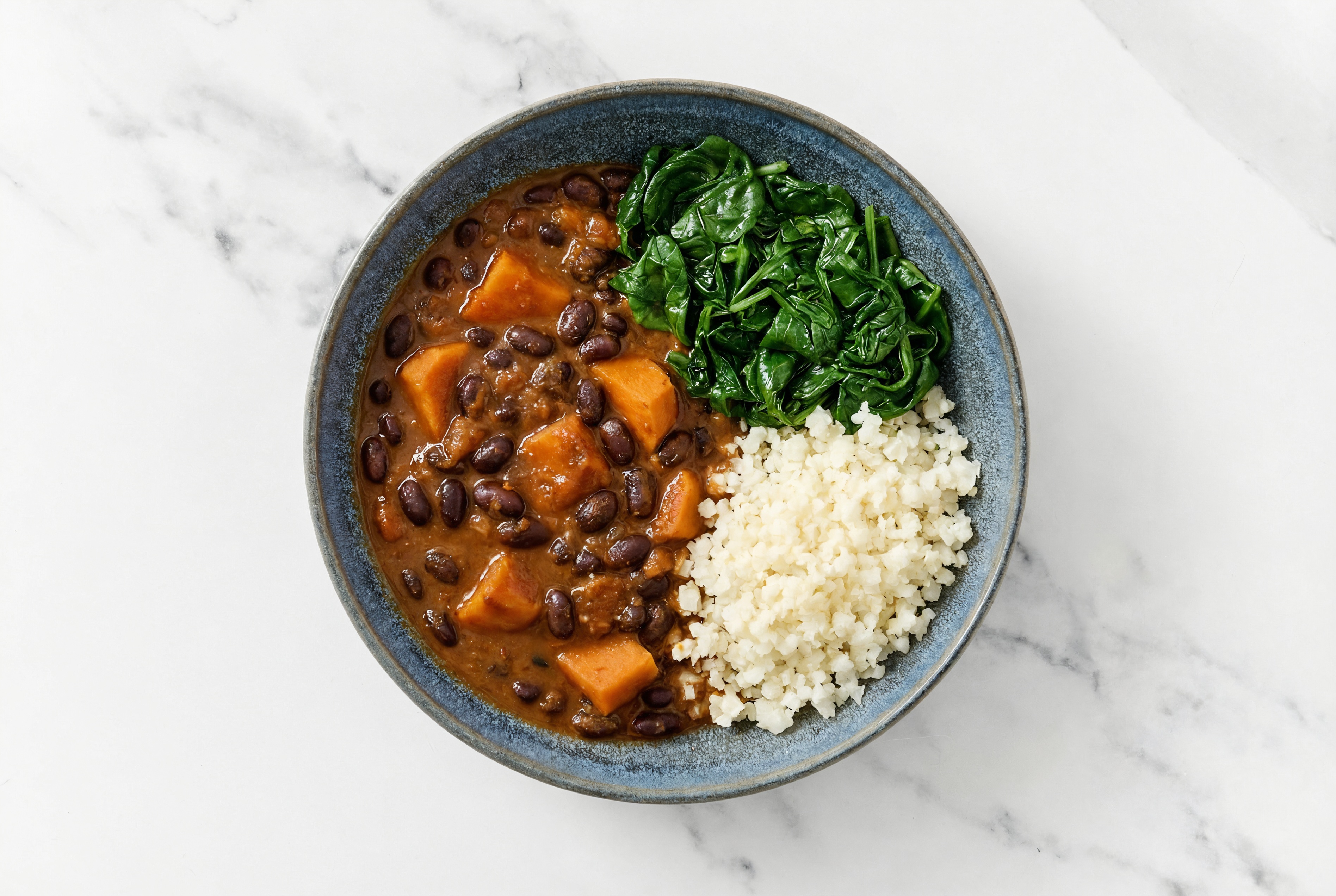 Sweet Potato Black Bean Vindaloo with Spinach + Cauliflower Rice