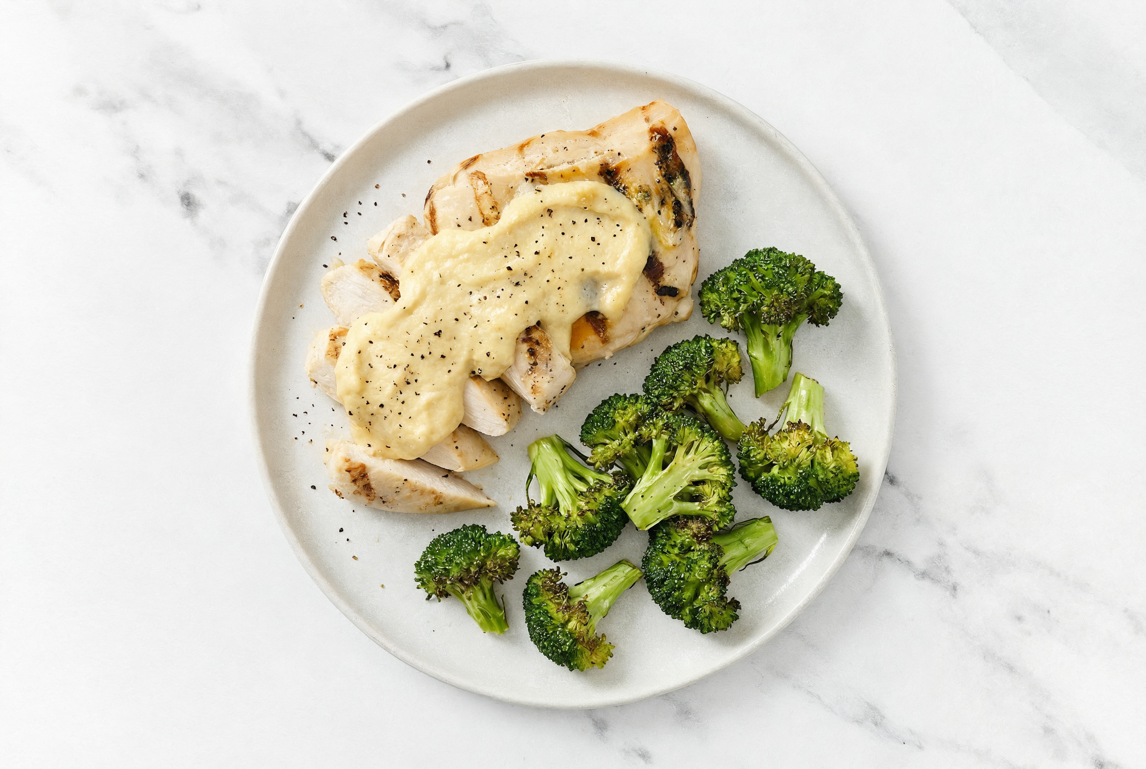 Extra Protein Hummus Baked Chicken + Roasted Broccoli