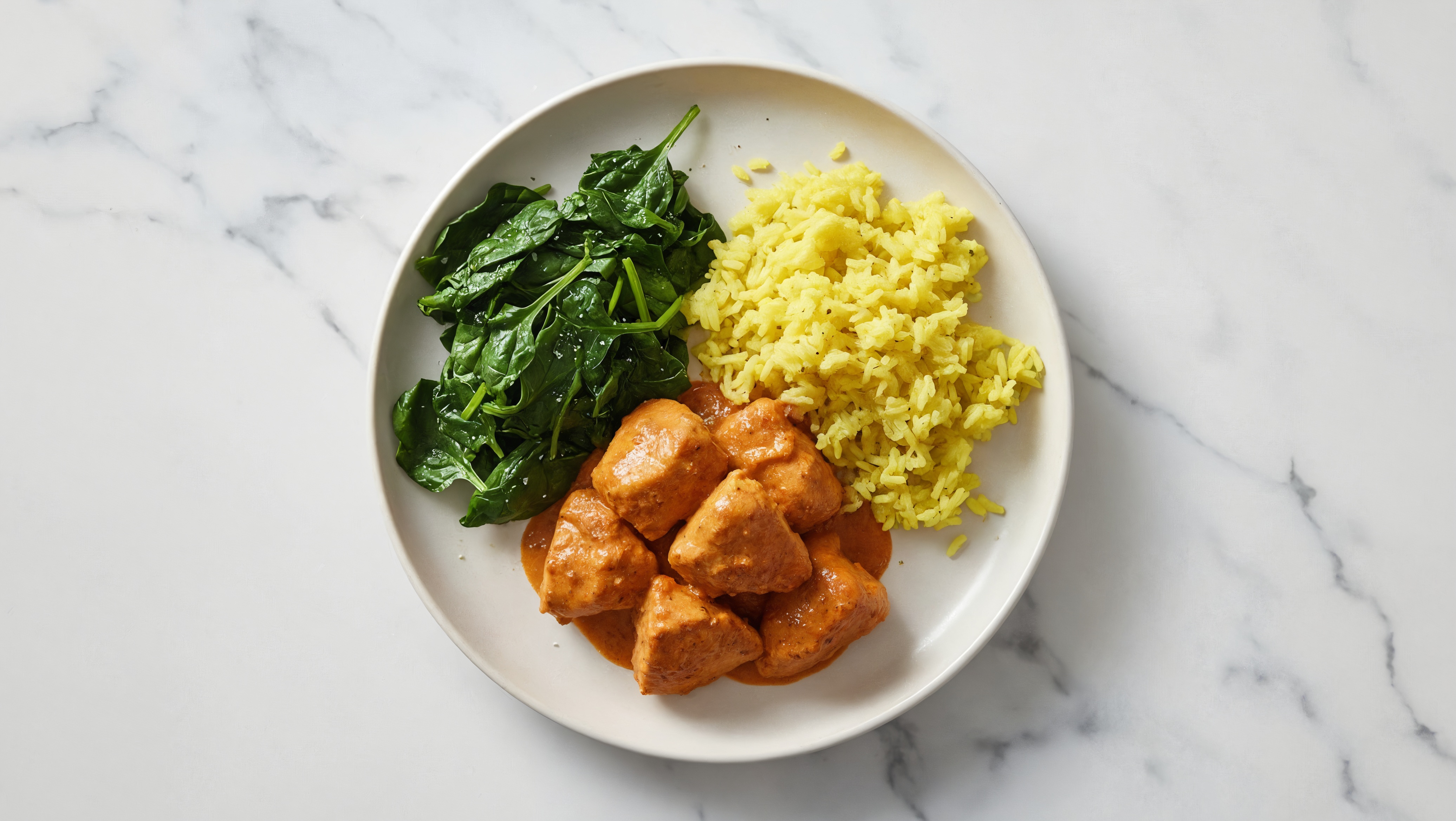 Creamy Chicken Tikka Masala with Herb Rice + Sautéed Baby Spinach