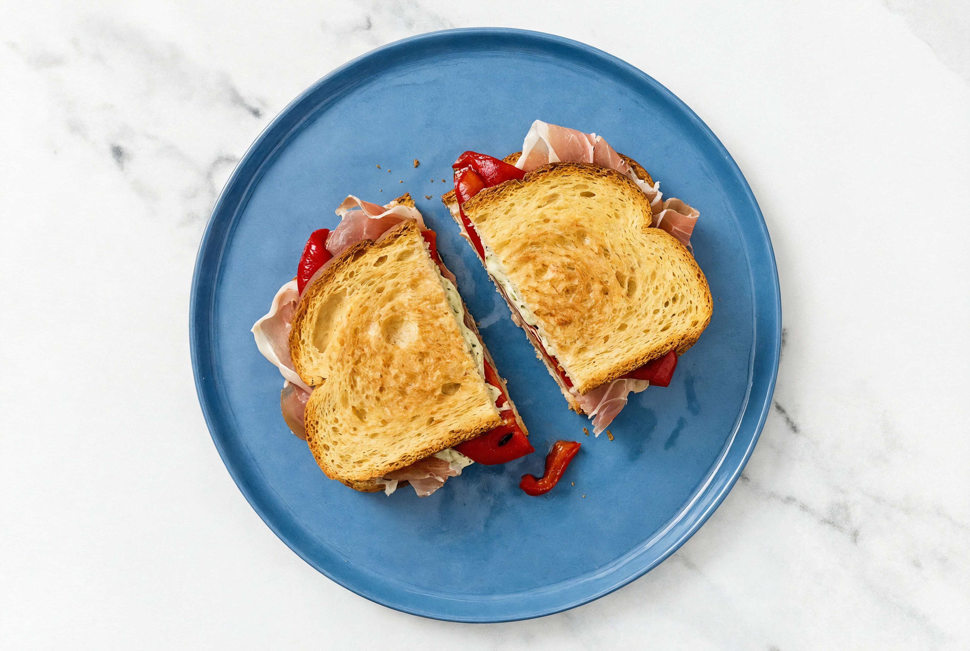 Dill Pickle Prosciutto Sandwich with Roasted Peppers on Honey White Bread