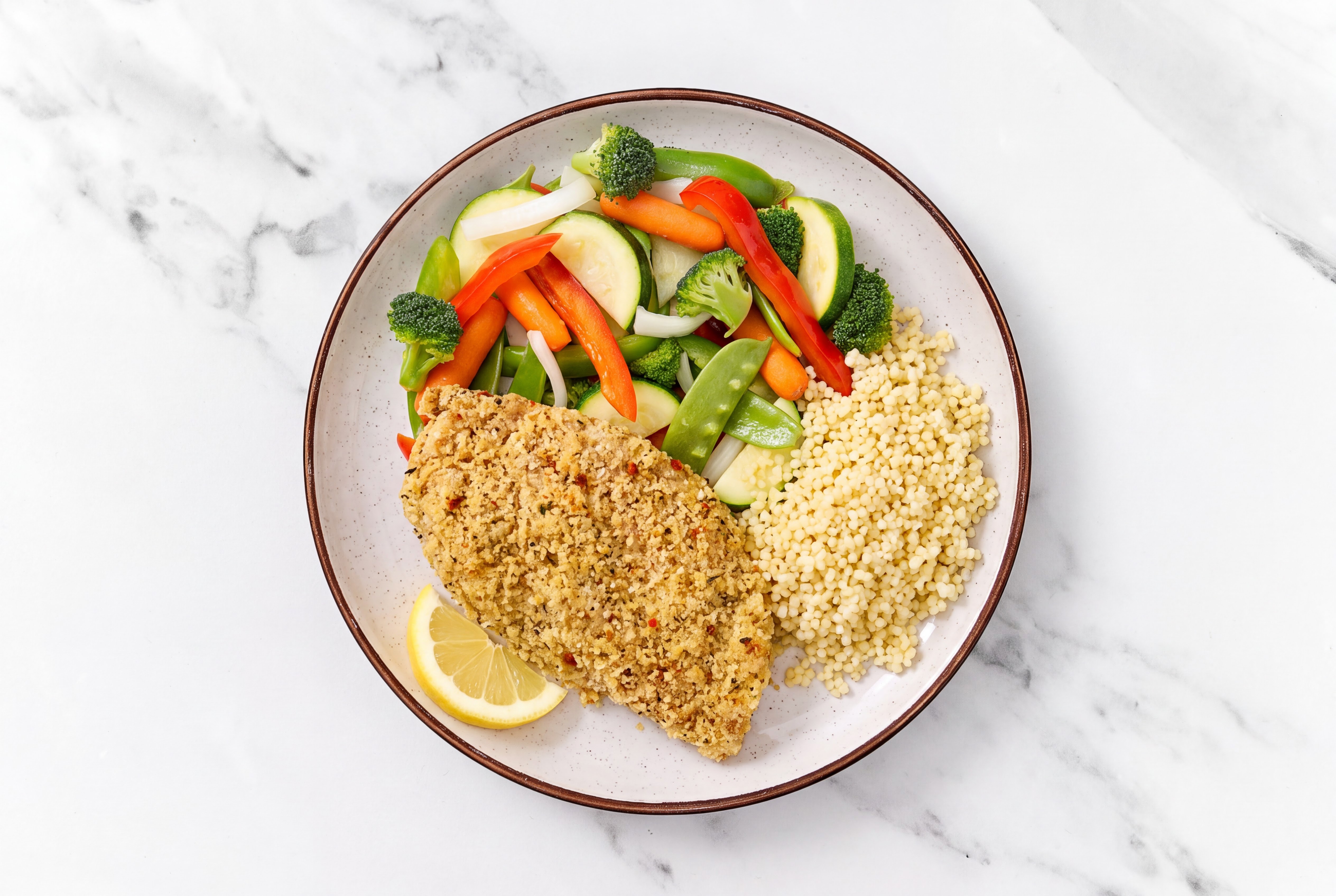 Lemon Parmesan Breaded Chicken Cutlet with Mixed Veggies & Couscous