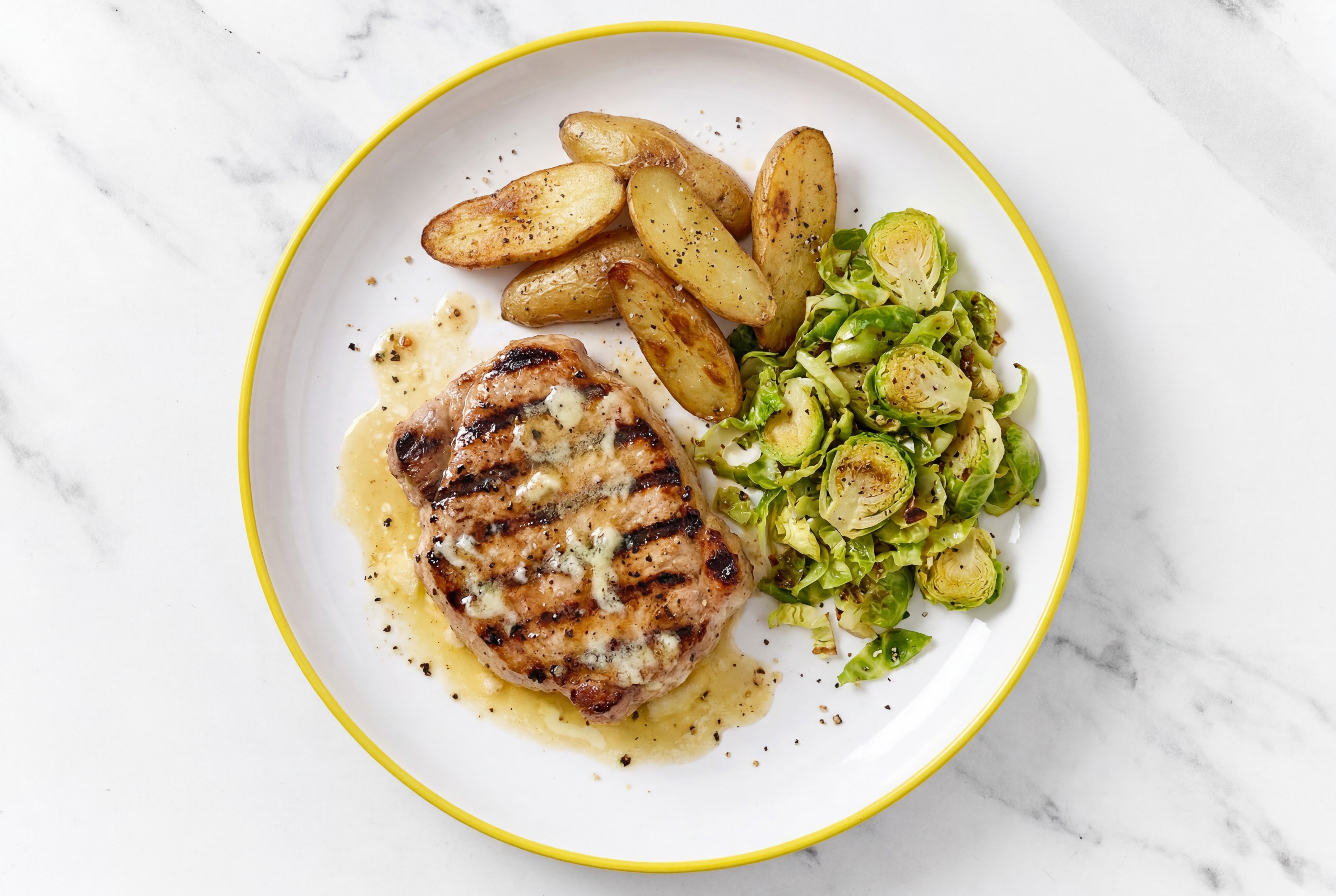 Lemon-Slow Churned Pasture Butter Pork Chops with Fingerling Potatoes & Brussels