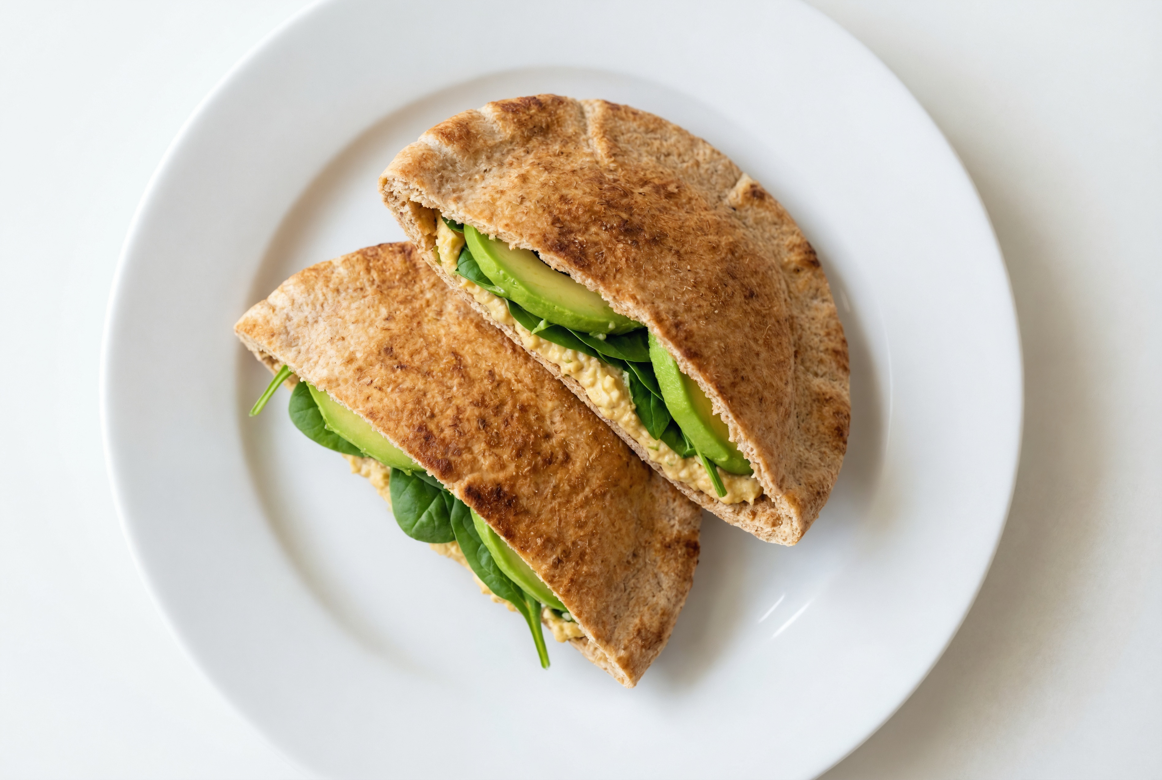 Lemon Garlic Hummus + Avocado Pita Pockets