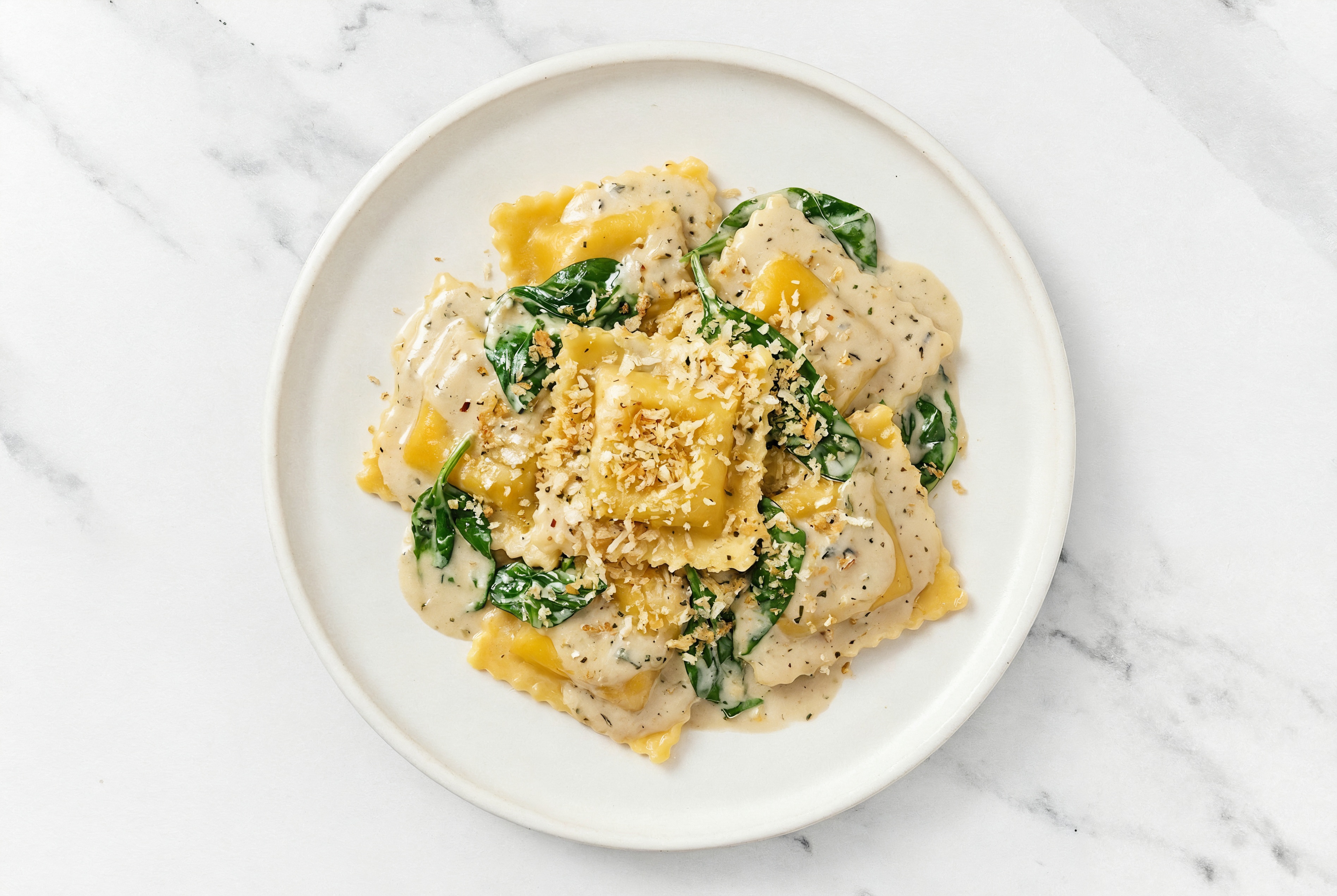 Cozy Creamed Spinach Squash Ravioli with Creamy Rosemary Mushroom Truffle Sauce