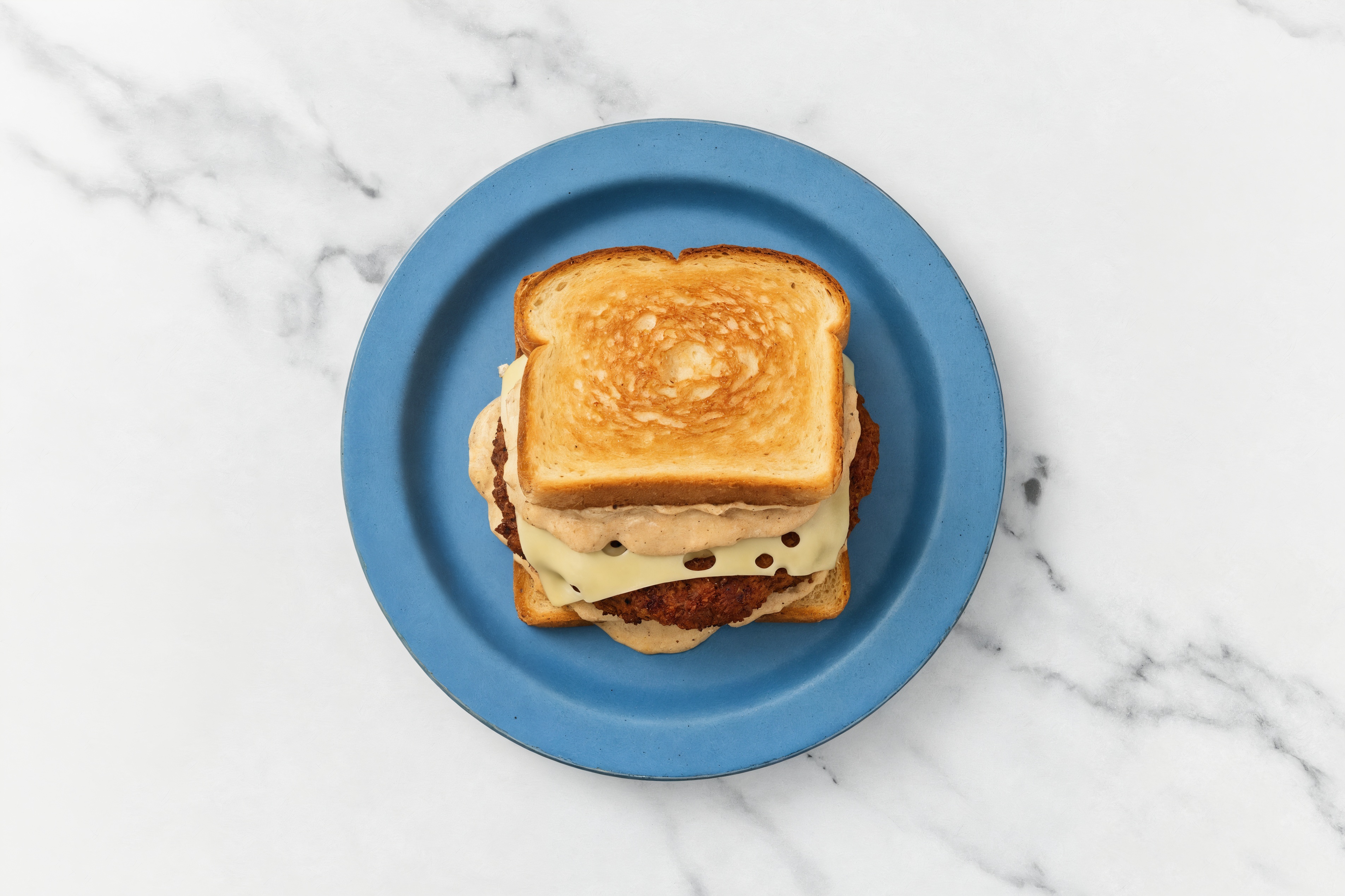 Swiss Beyond Burger on GF Bread with French Onion Sauce