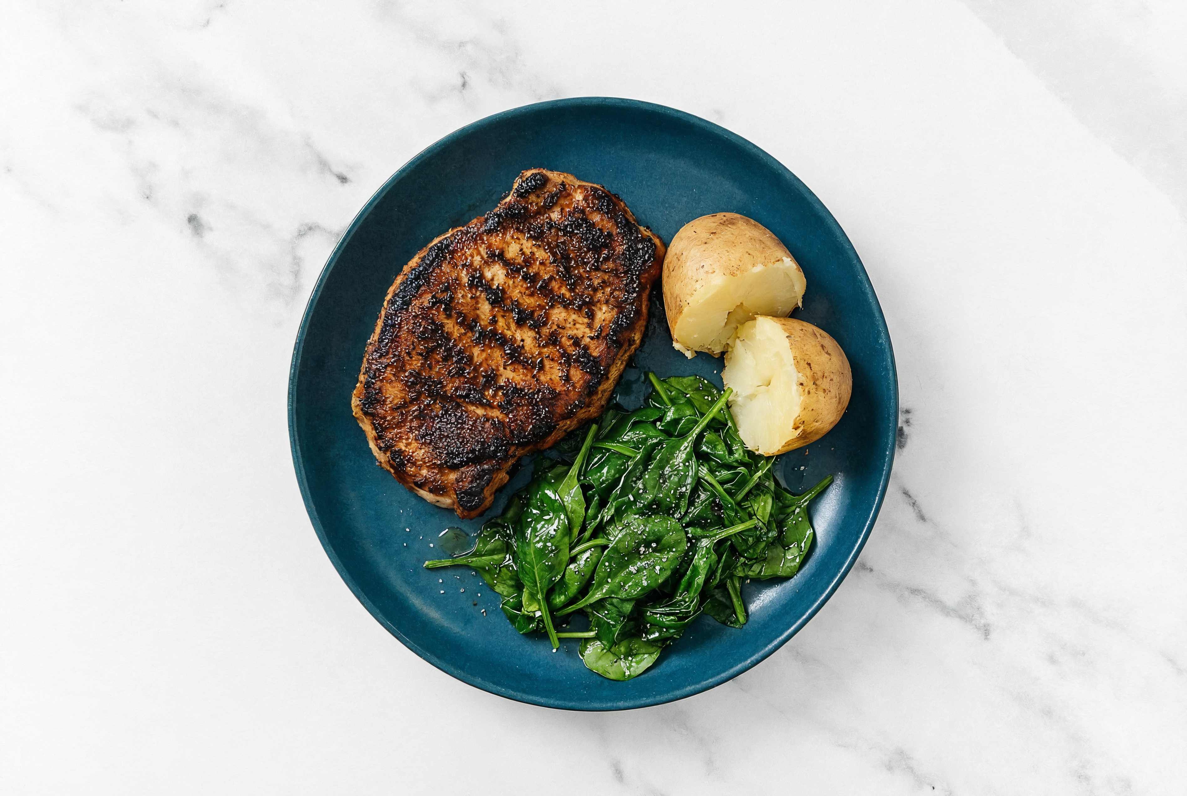 Blackened Pork Chop + Potato with Baby Spinach