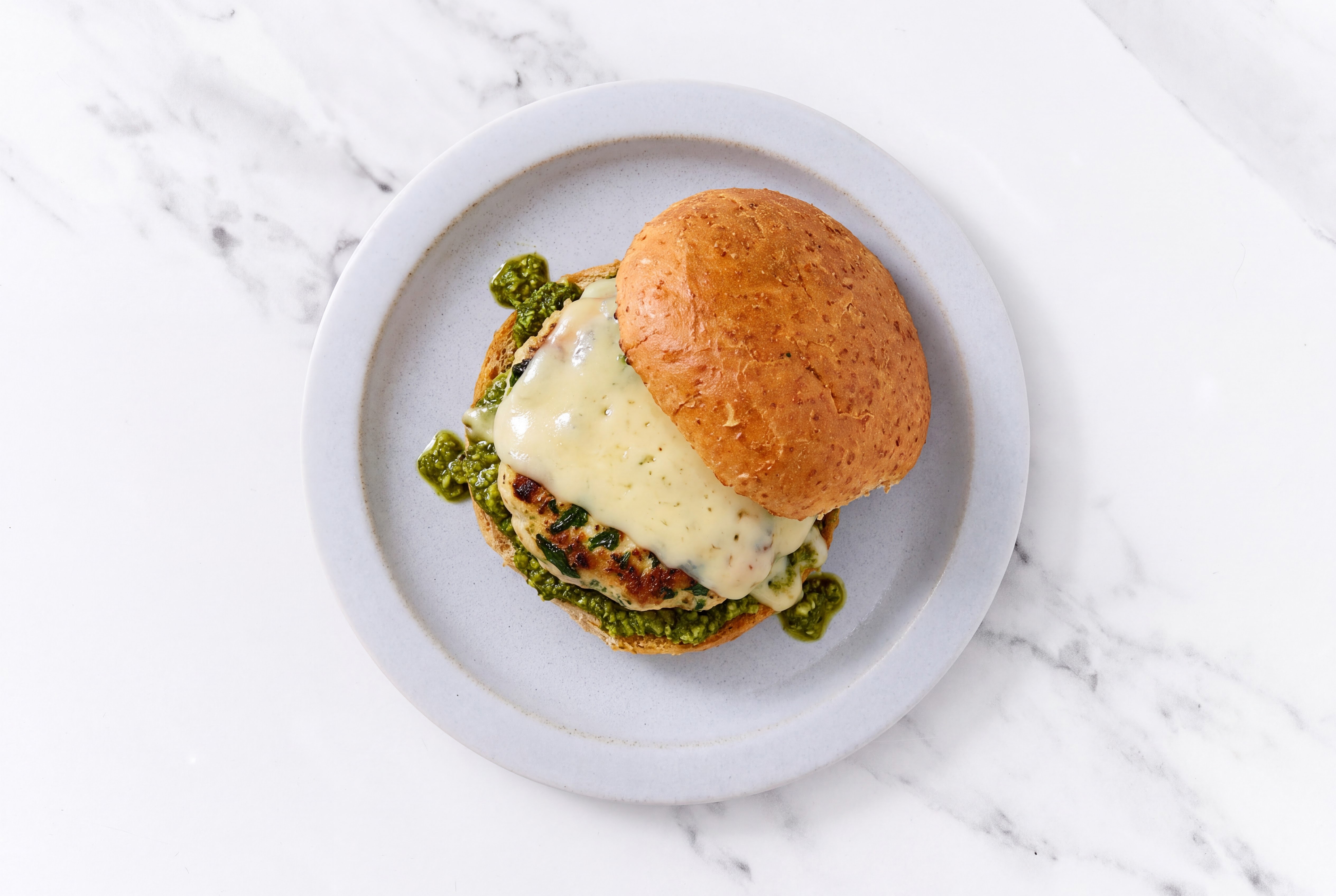 Garlic Turkey Burger on Sprouted Grain with Spinach Pesto & Havarti