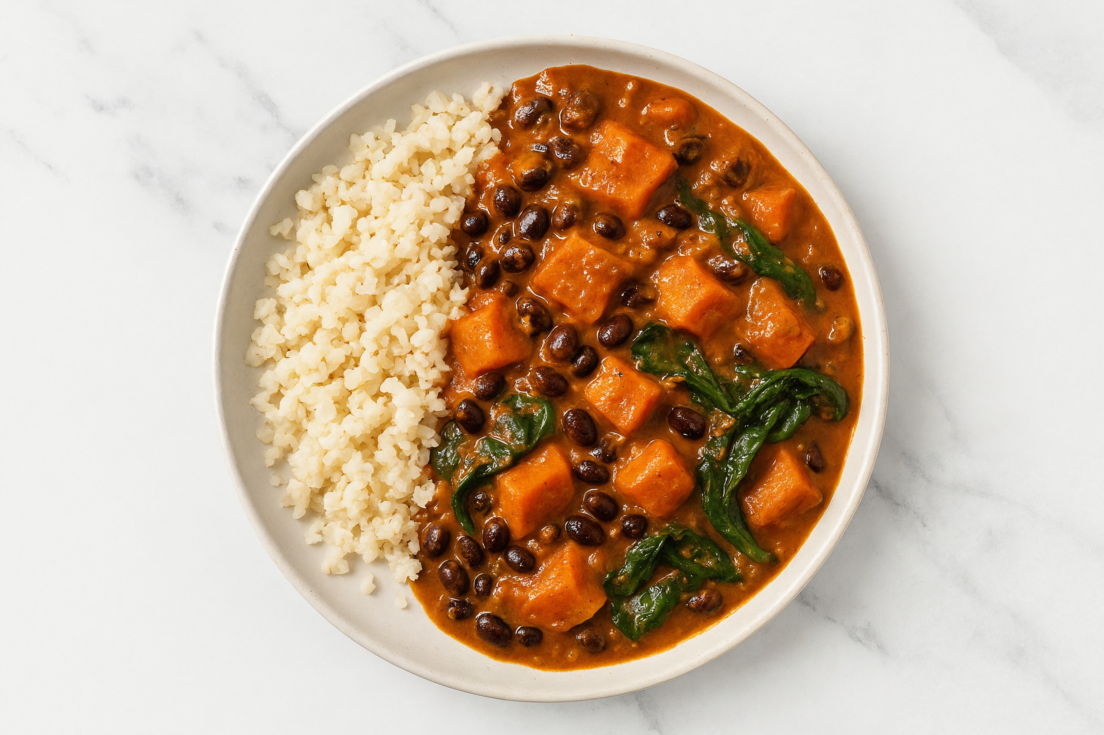 Sweet Potato Black Bean Tikka with Spinach + Cauliflower Rice