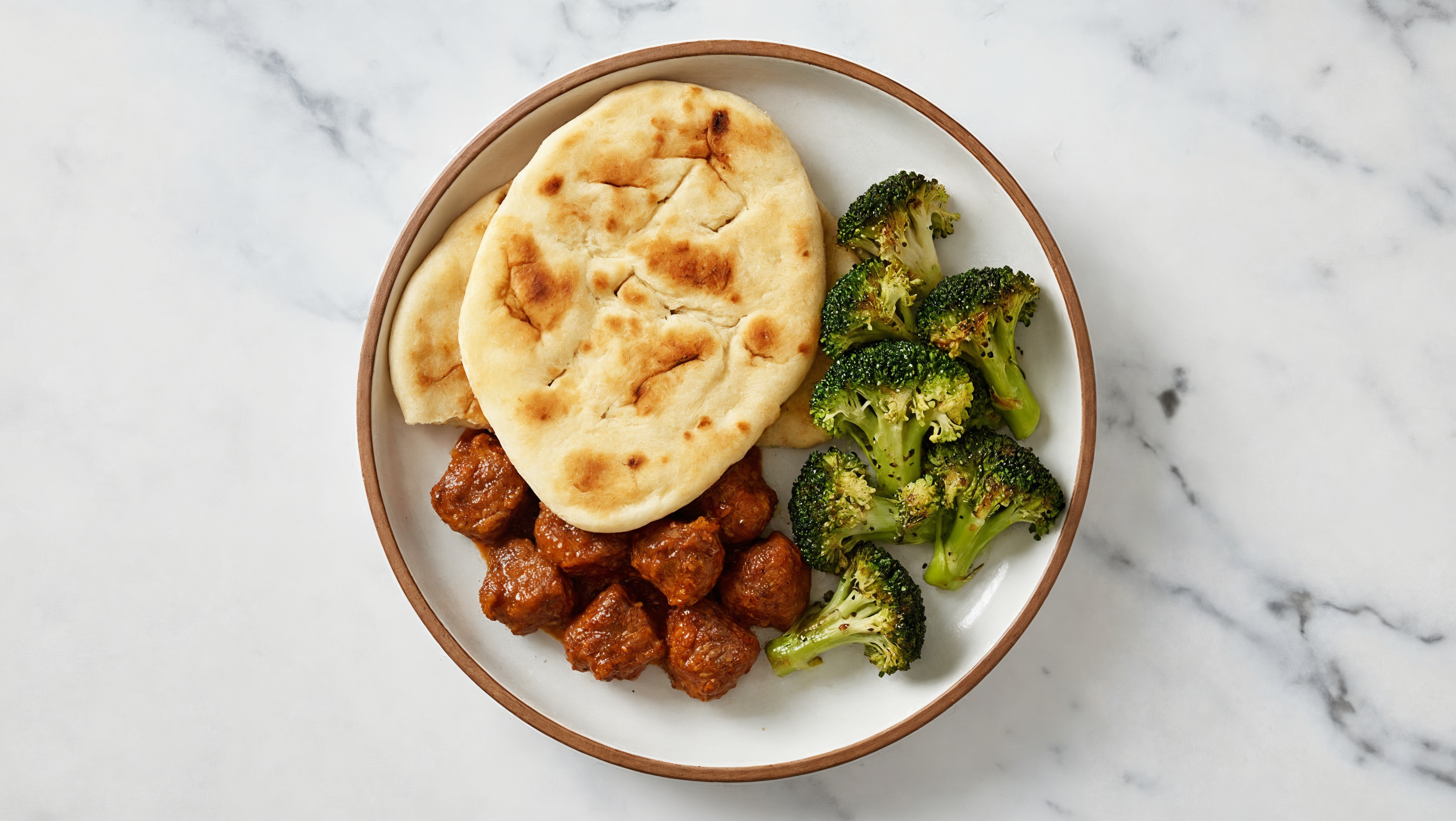 Lamb Tikka Masala with Organic Broccoli + Naan