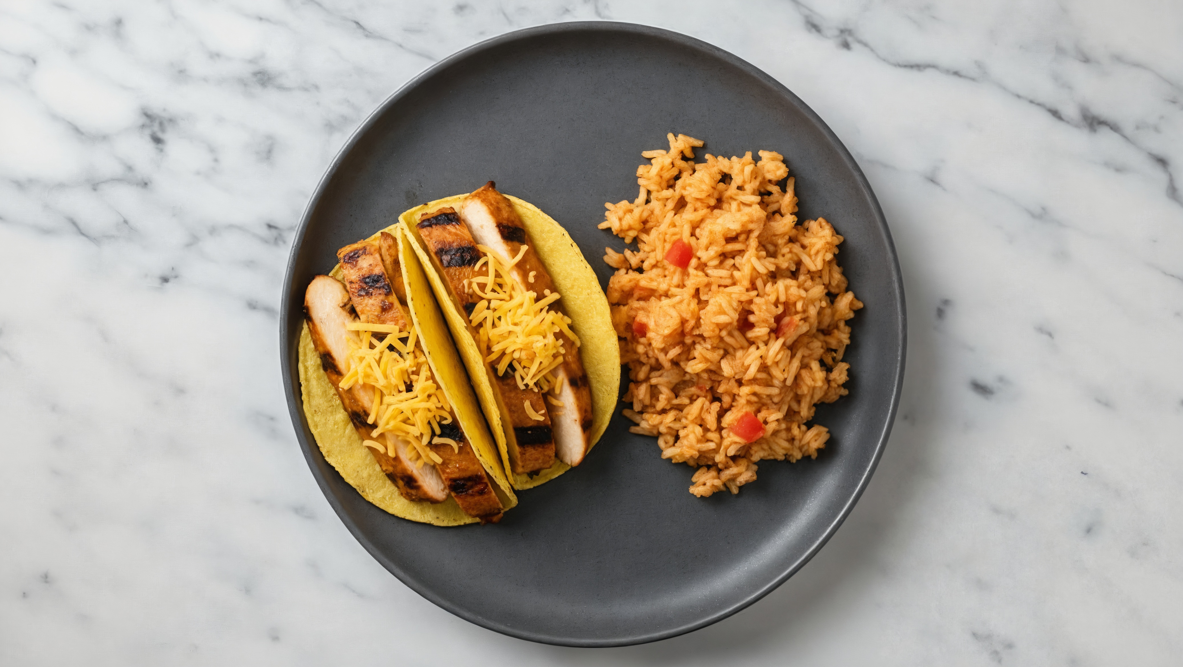 Herby Cheesy Blackened Chicken Tacos + Mexican Rice with Shredded Sharp Cheddar Cheese