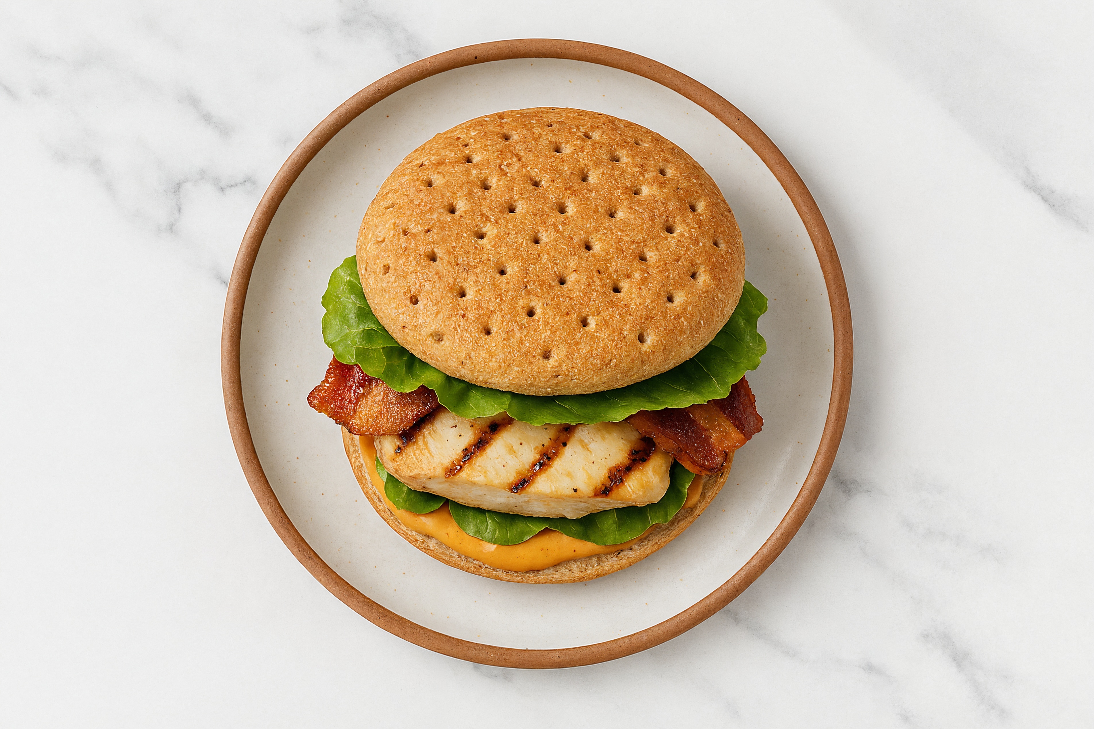 Chicken + Applewood Smoked Pork Bacon on Multigrain with Smoky BBQ Garlic Sauce