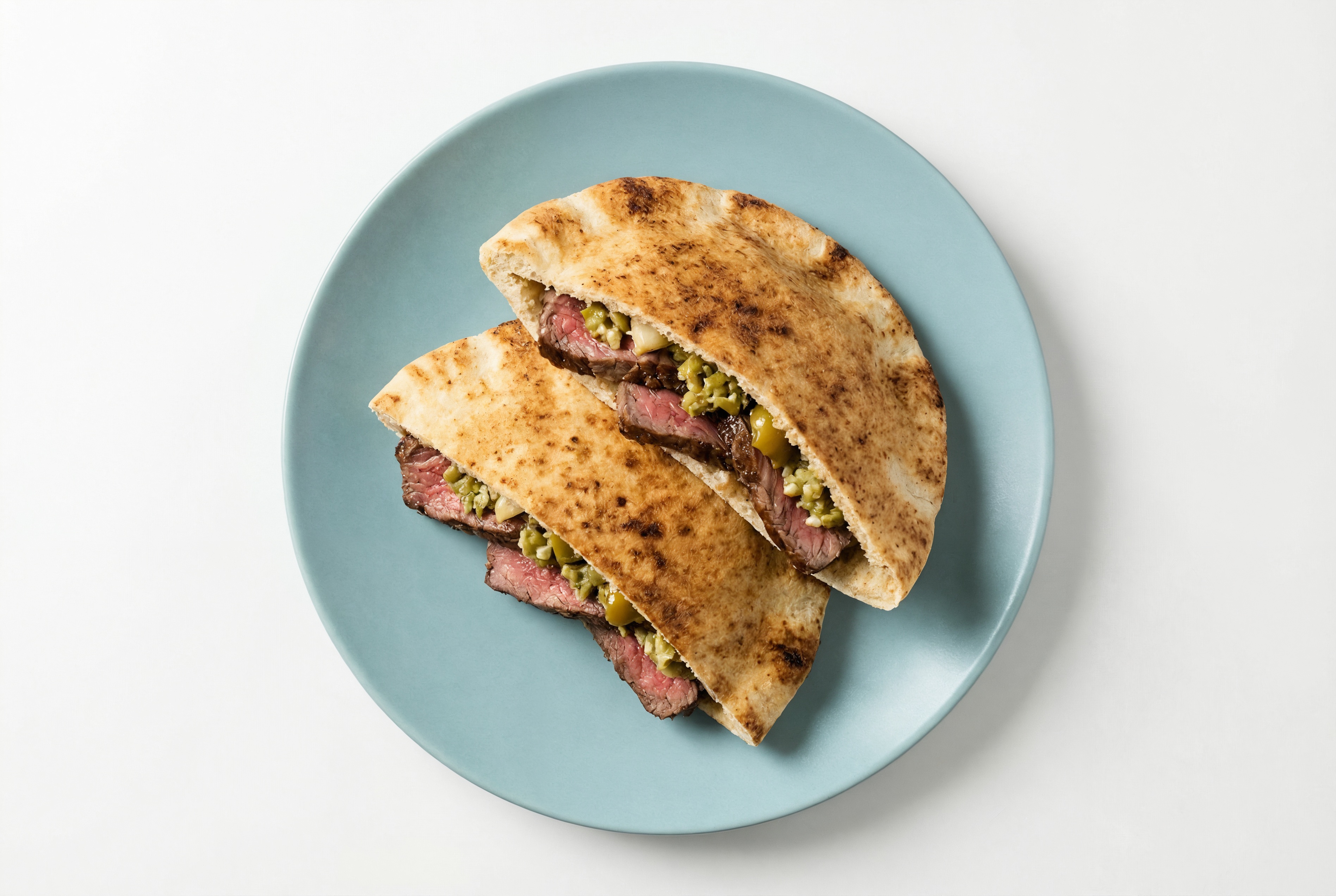 Wagyu Ribeye Steak Traditional Pita + Roasted Garlic-Olive Tapenade