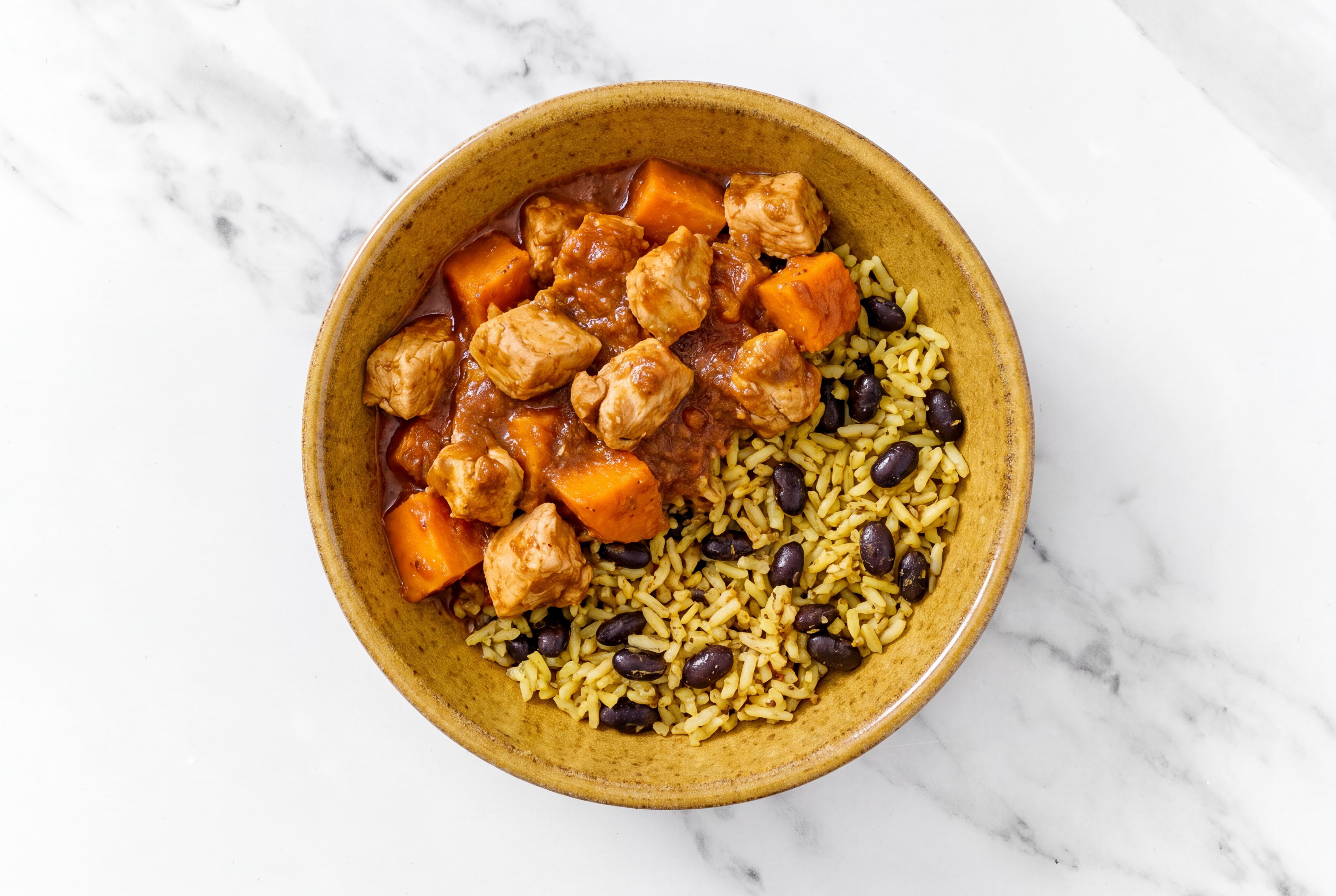 Chicken Sweet Potato Vindaloo over  Rice with Beans